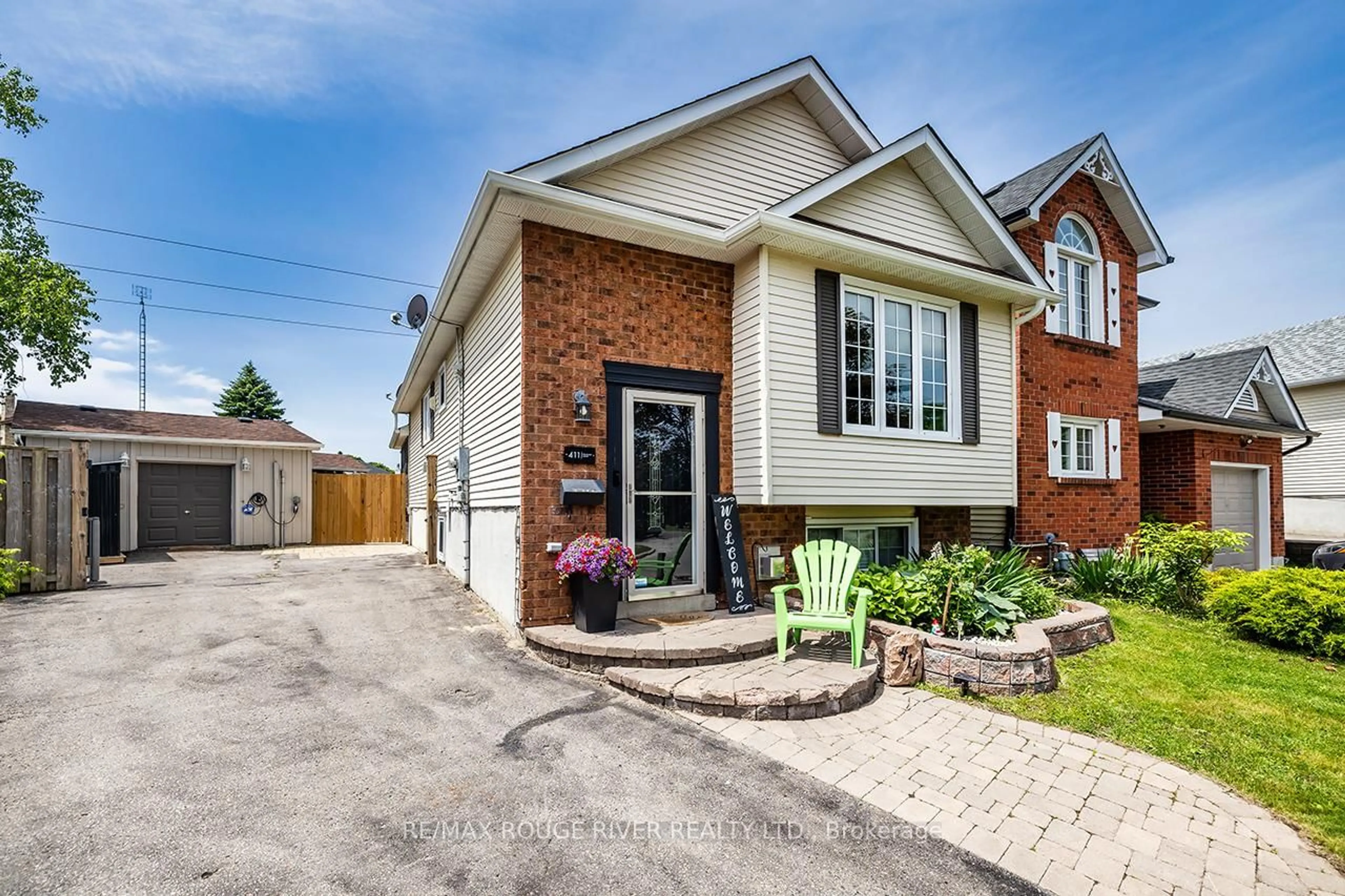 Home with brick exterior material, street for 411 Pompano Crt, Oshawa Ontario L1K 1M9