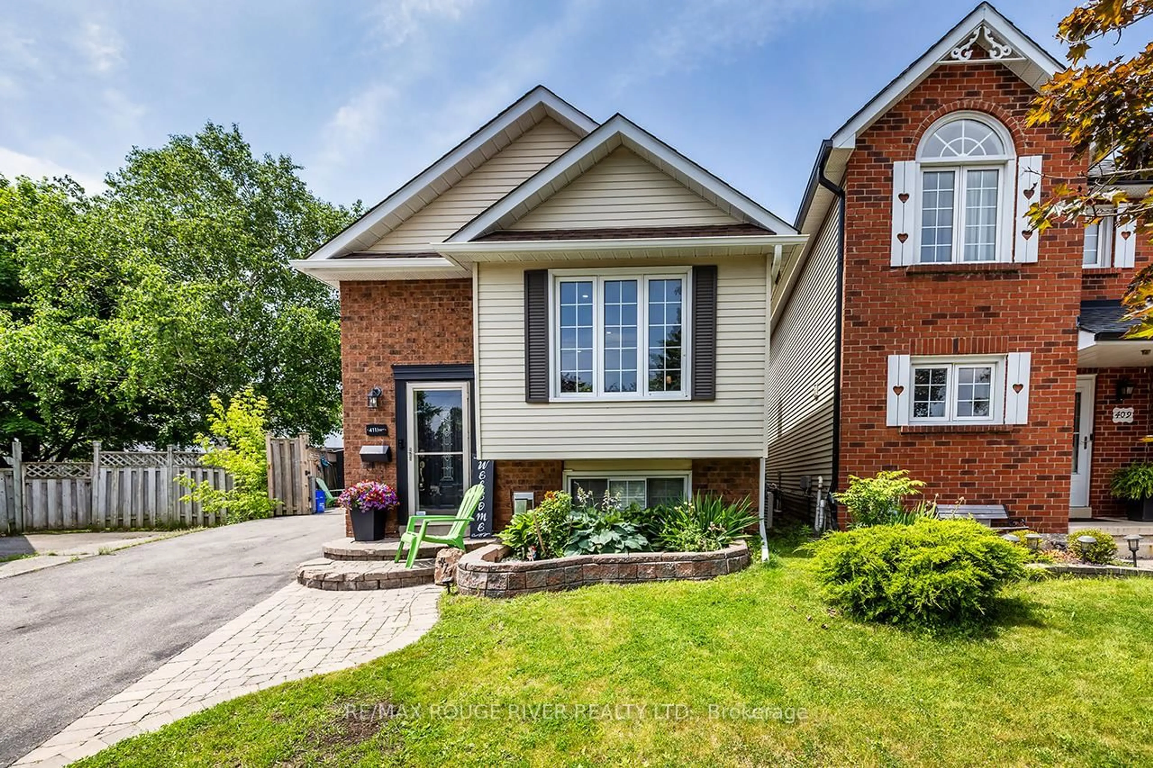 Home with brick exterior material, street for 411 Pompano Crt, Oshawa Ontario L1K 1M9