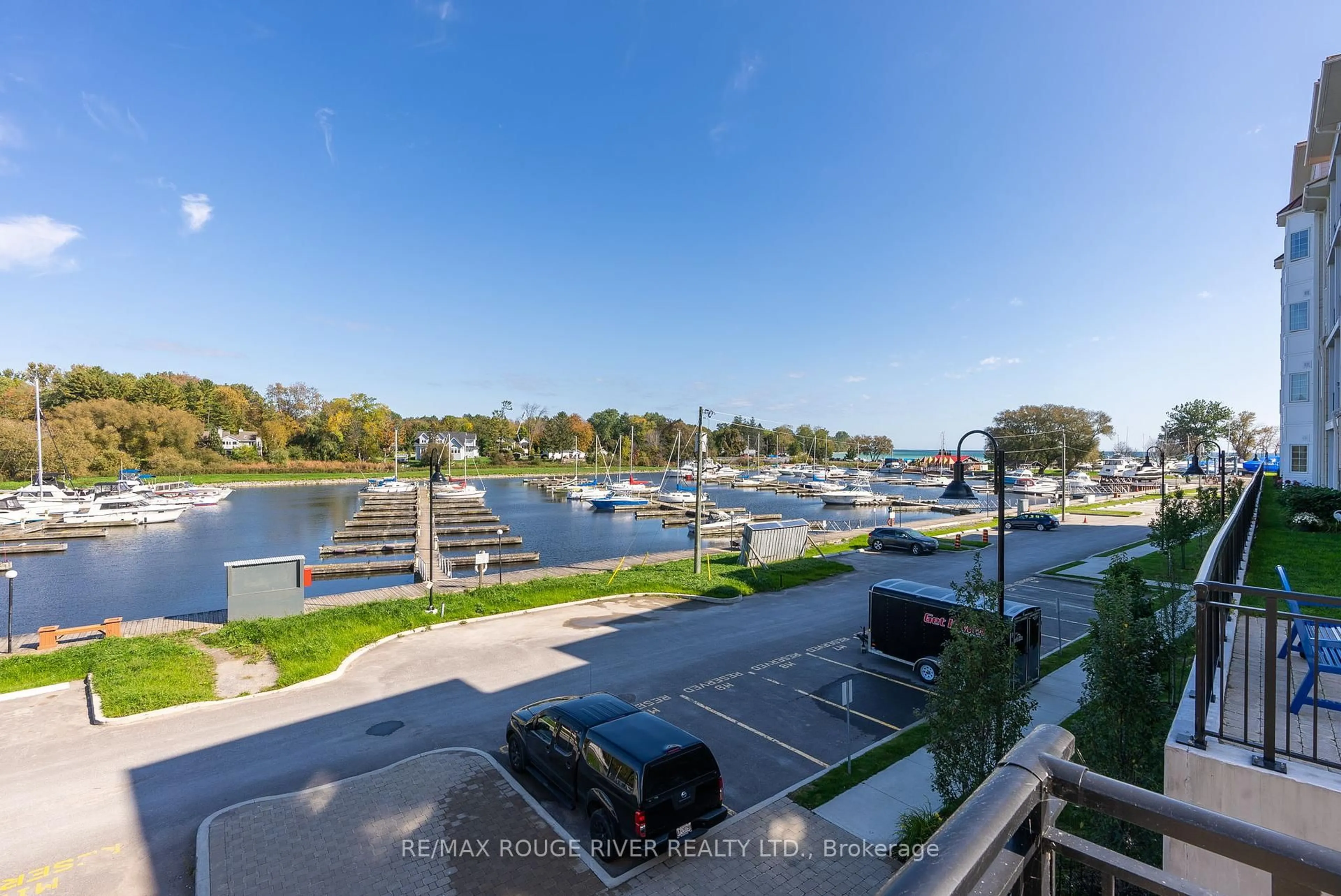 A pic from outside/outdoor area/front of a property/back of a property/a pic from drone, water/lake/river/ocean view for 70 Shipway Ave #206, Clarington Ontario L1B 0A1
