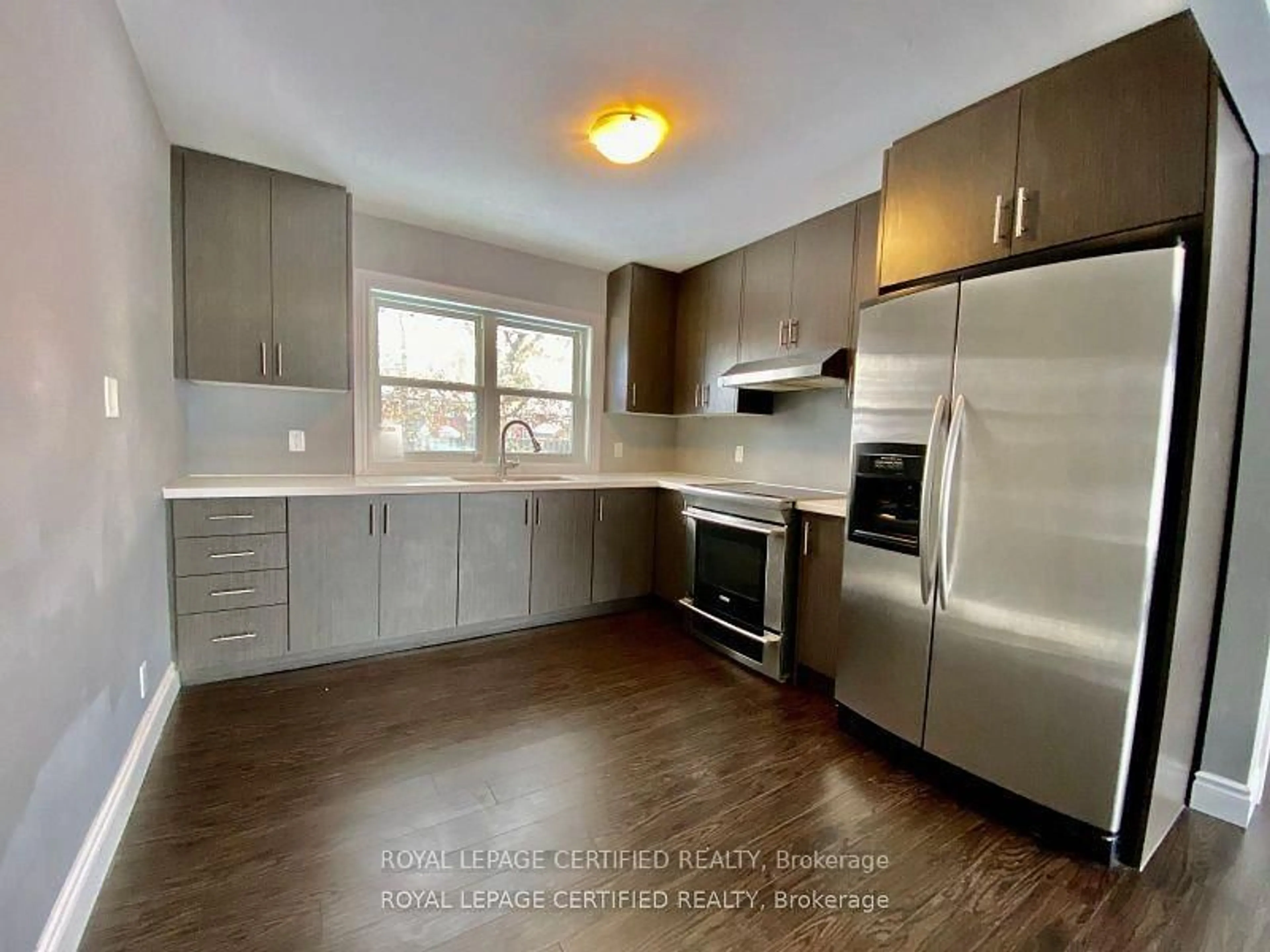 Open concept kitchen, wood/laminate floor for 789 Regent Dr, Oshawa Ontario L1G 1H8