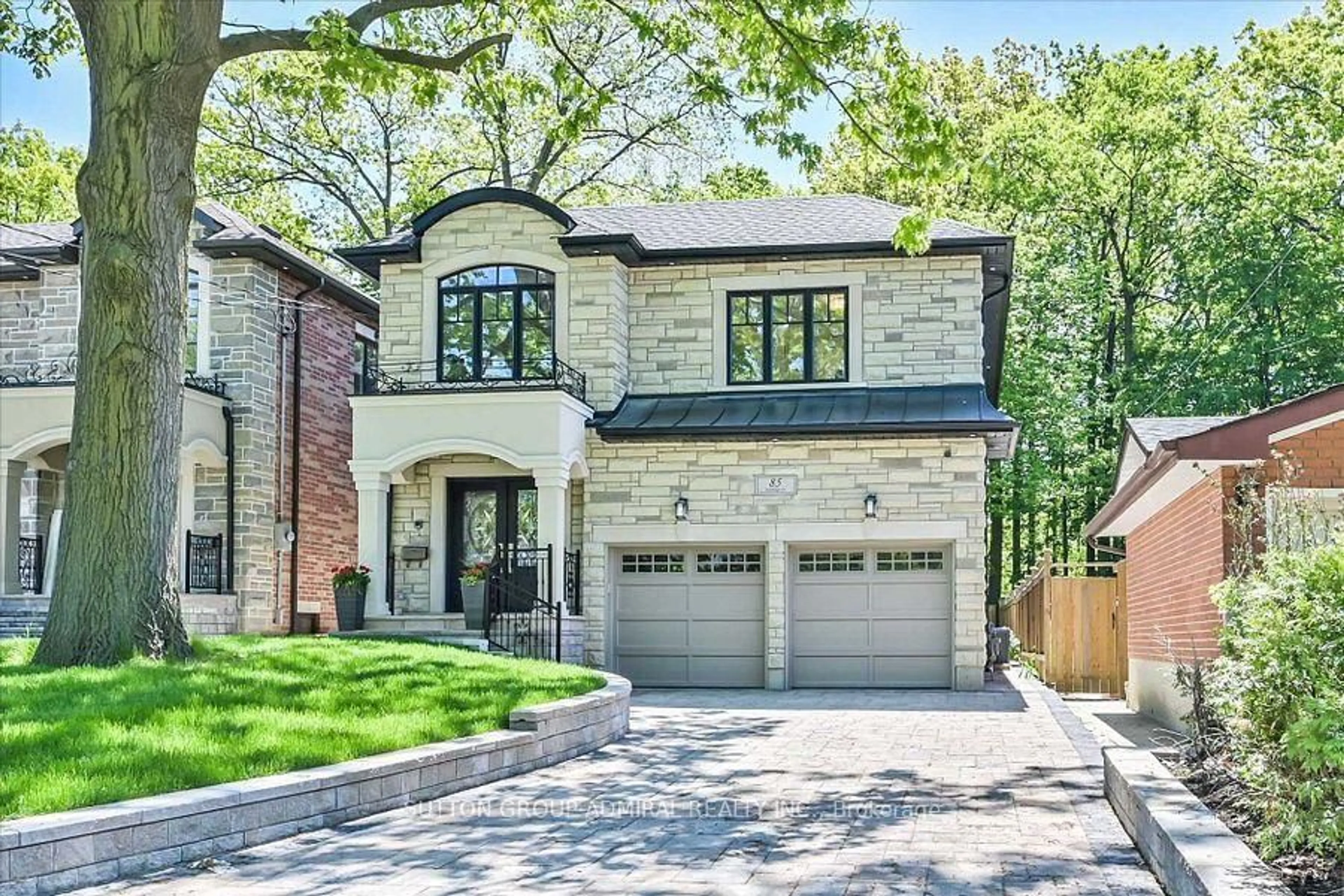 Home with brick exterior material, street for 85 Oakridge Dr, Toronto Ontario M1M 2A6