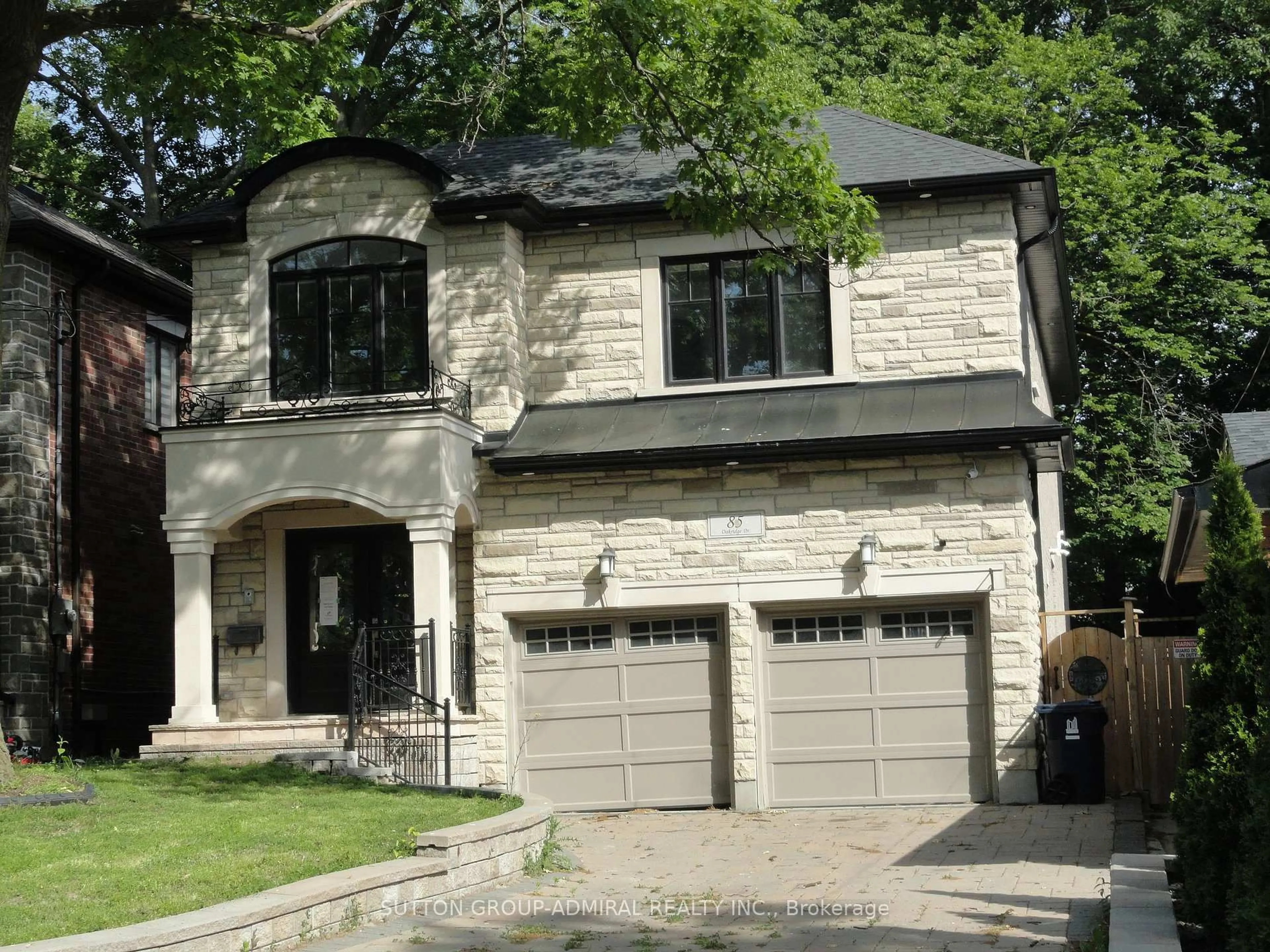 Home with brick exterior material, street for 85 Oakridge Dr, Toronto Ontario M1M 2A6