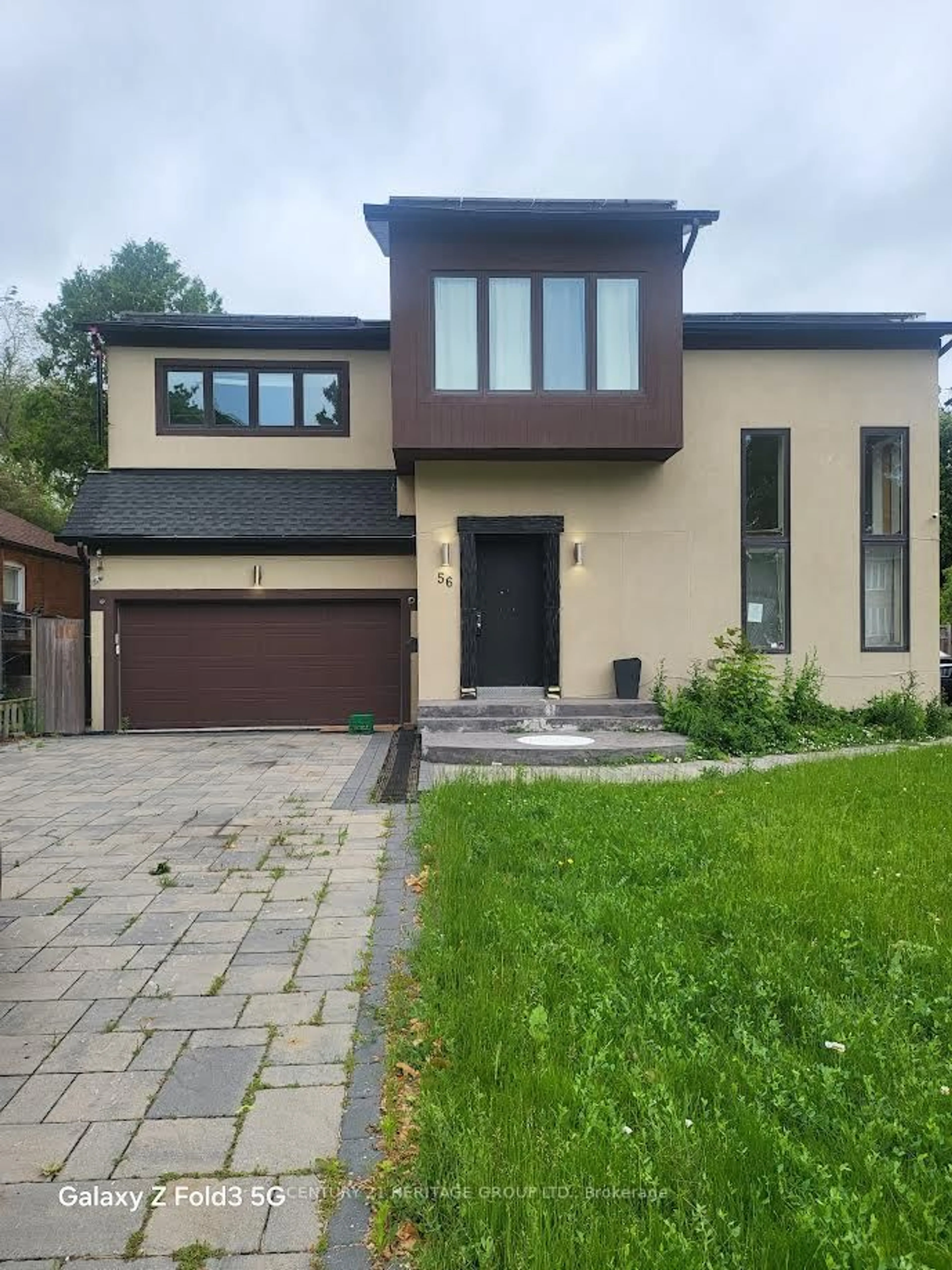 Home with brick exterior material, street for 56 Martindale Rd, Toronto Ontario M1M 2C1