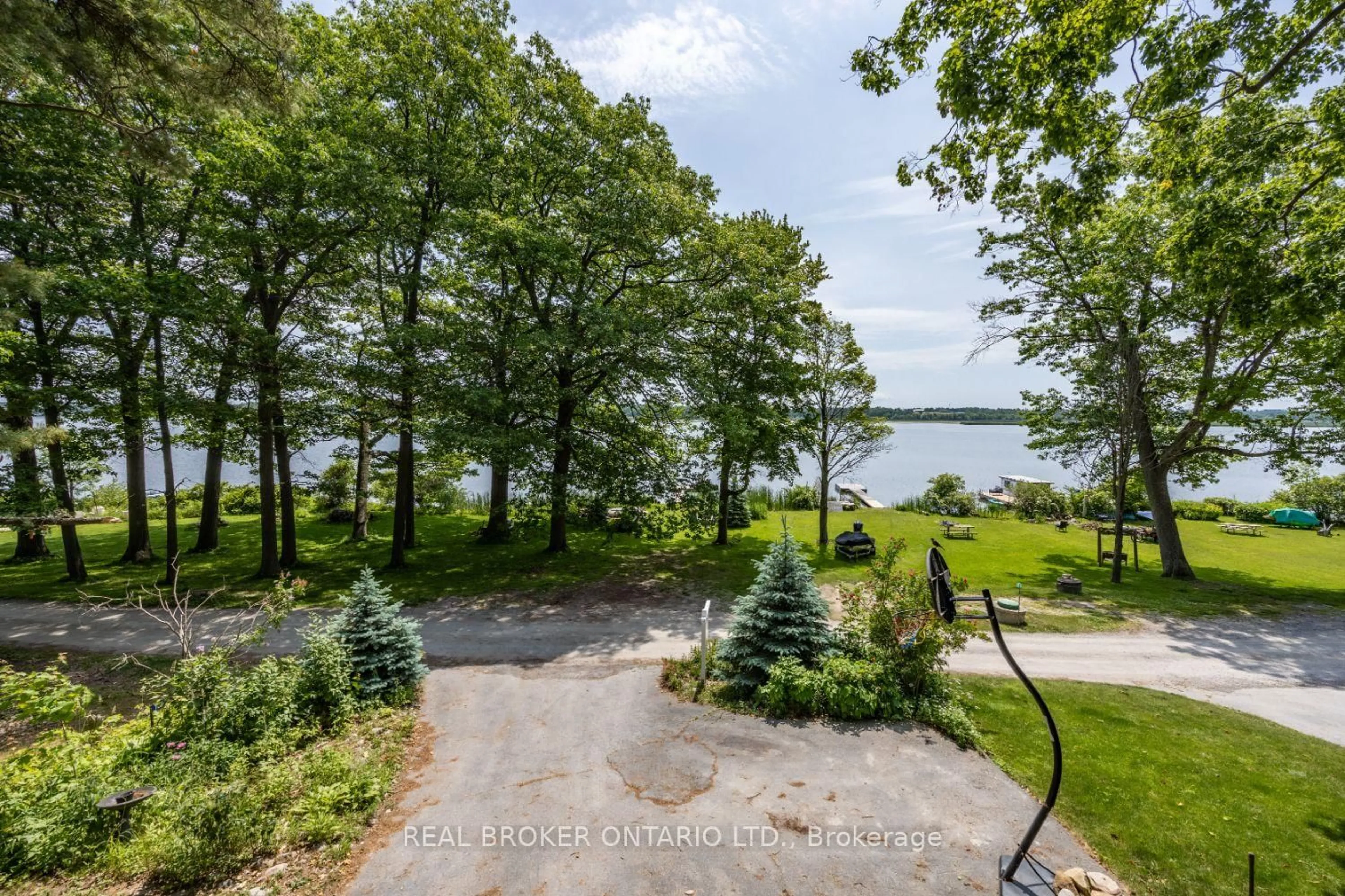 A pic from outside/outdoor area/front of a property/back of a property/a pic from drone, water/lake/river/ocean view for 126 Pine Point Lane, Scugog Ontario L9L 1B4
