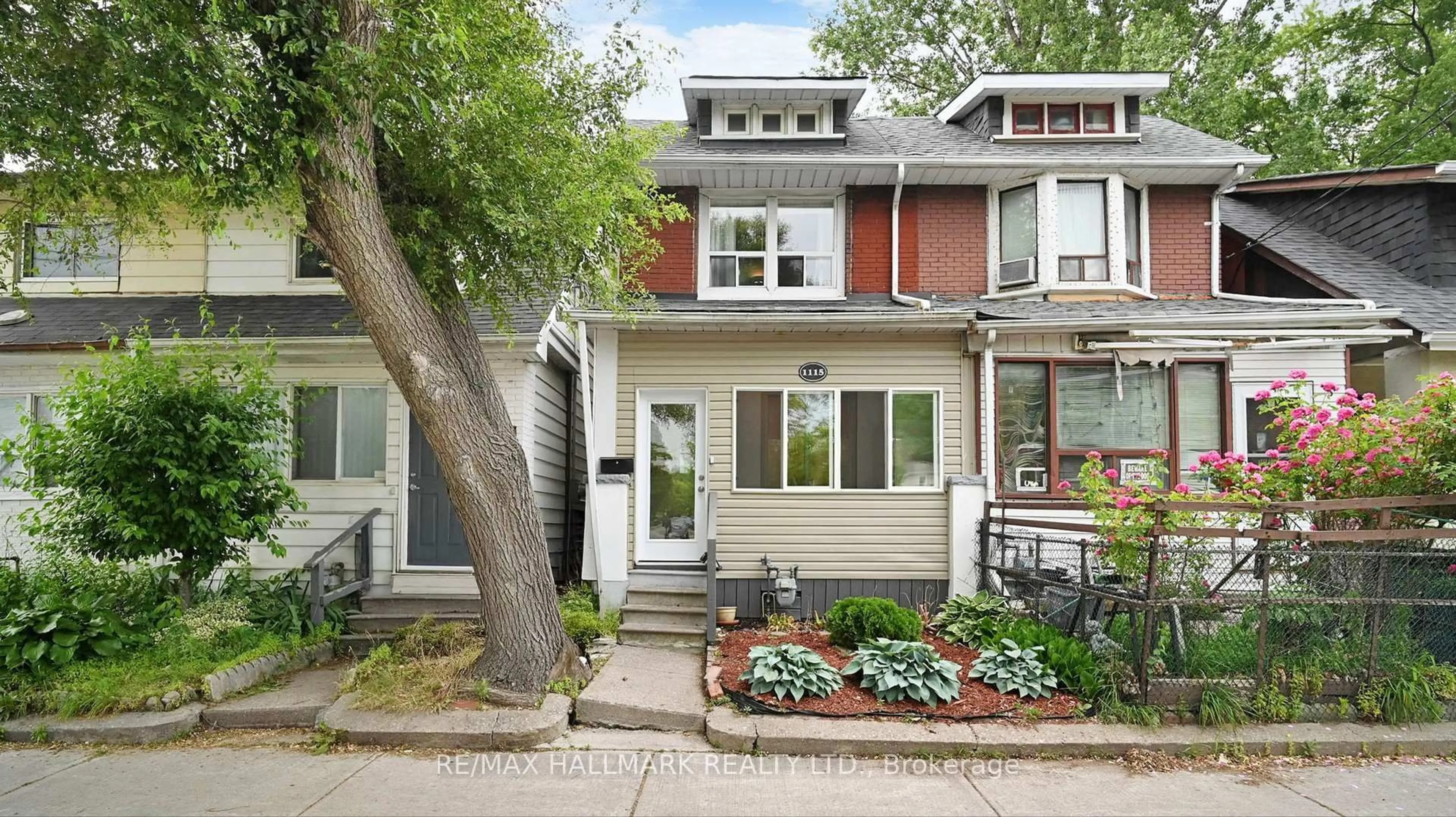 Home with brick exterior material, street for 115 Woodbine Ave Ave, Toronto Ontario M4C 4C6