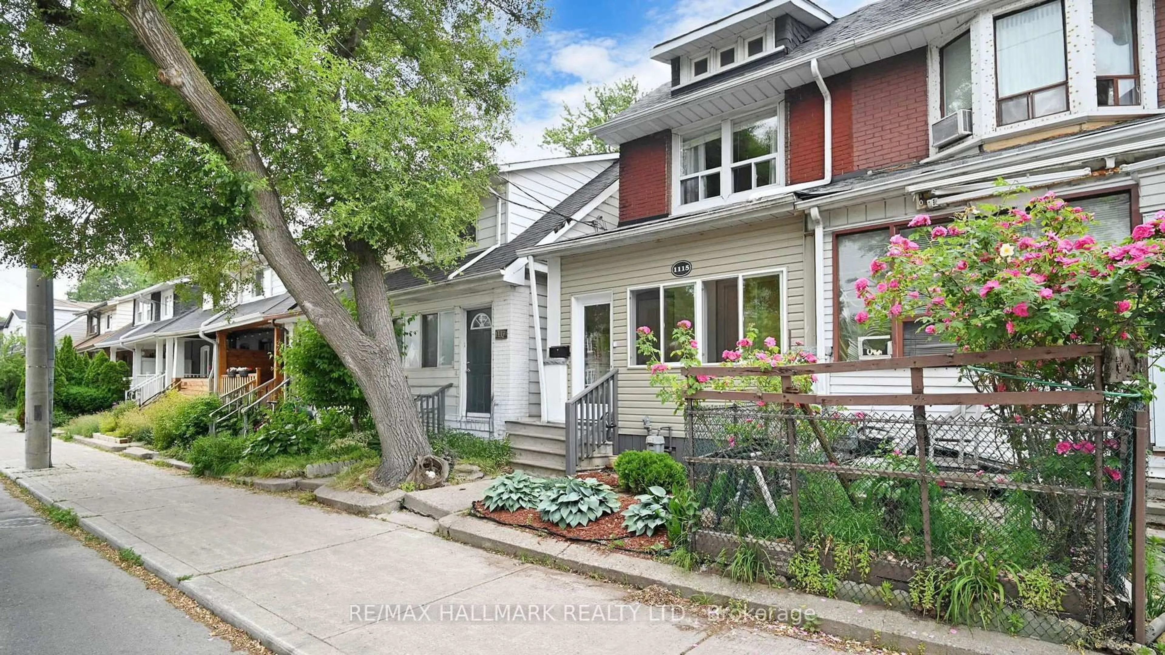Home with brick exterior material, street for 1115 Woodbine Ave, Toronto Ontario M4C 4C6