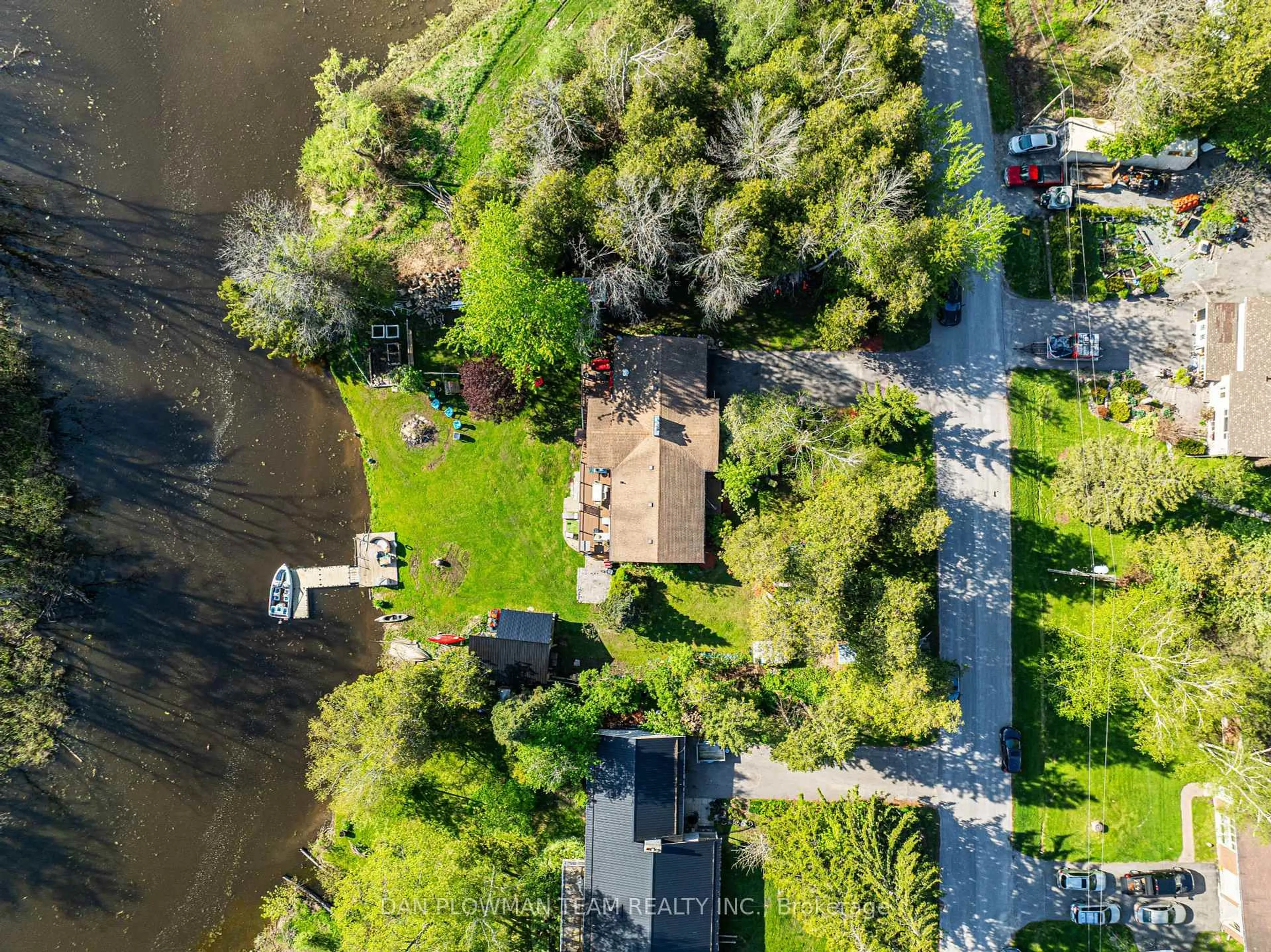 A pic from outside/outdoor area/front of a property/back of a property/a pic from drone, water/lake/river/ocean view for 32 Nonquon Dr, Scugog Ontario L0C 1G0