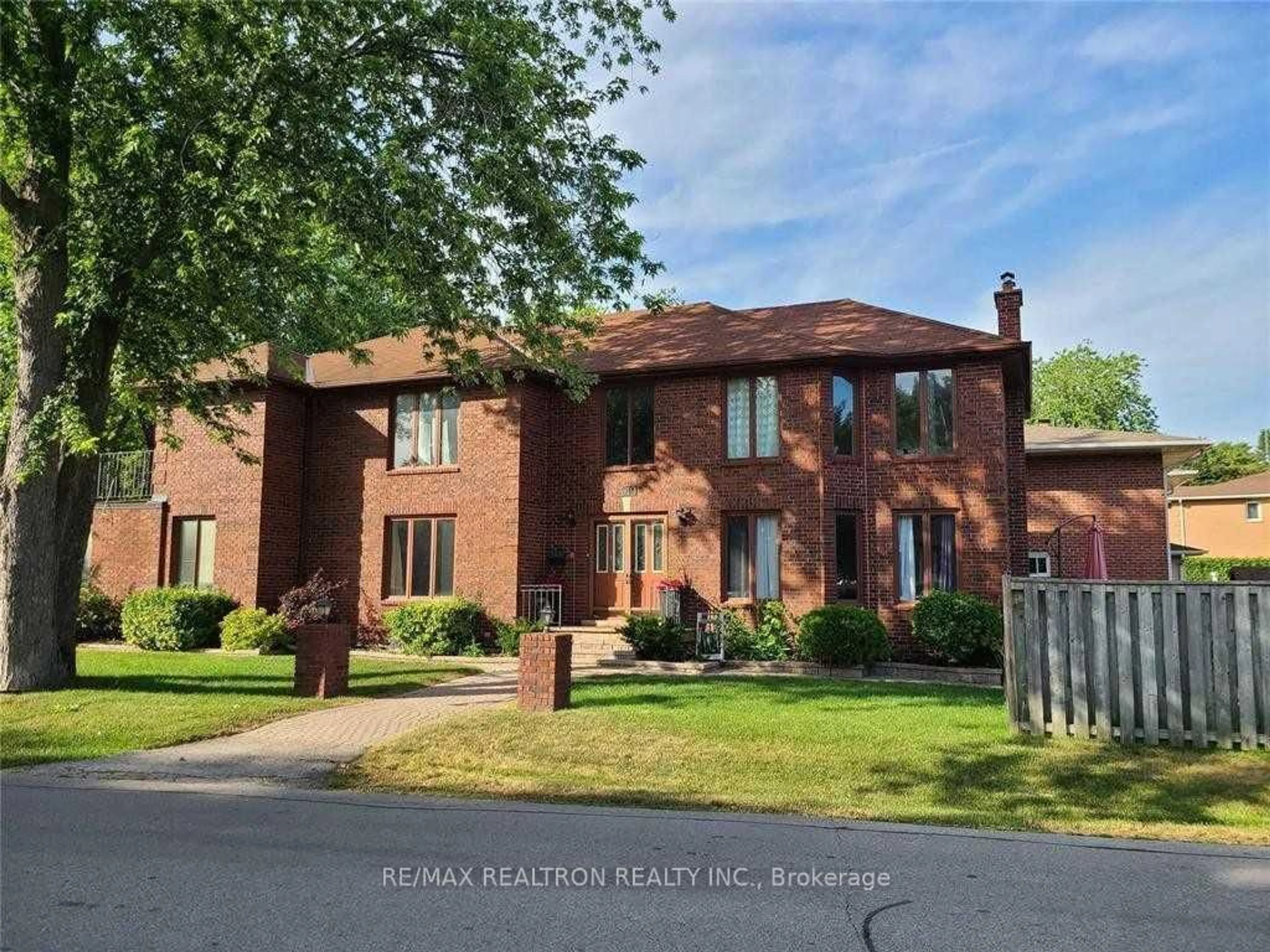 Home with brick exterior material, street for 309 Rouge Hills Dr, Toronto Ontario M1C 2Z2