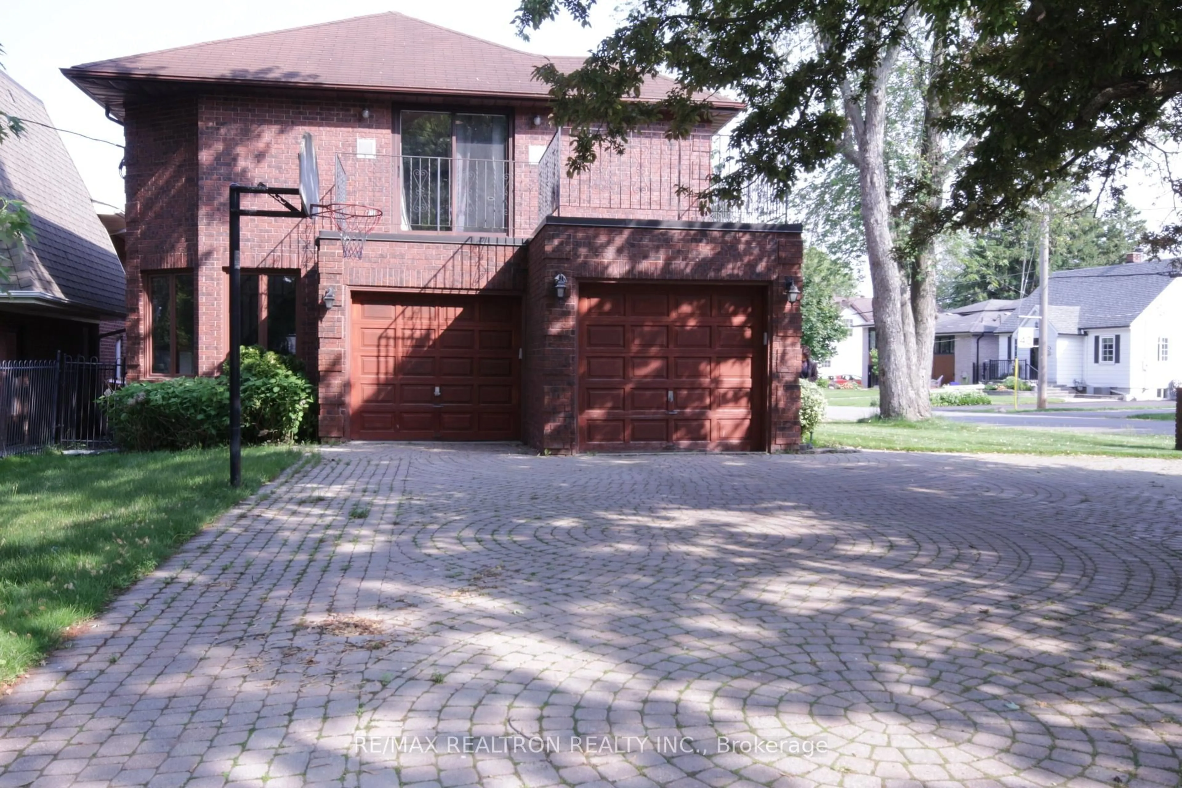 Home with brick exterior material, street for 309 Rouge Hills Dr, Toronto Ontario M1C 2Z2