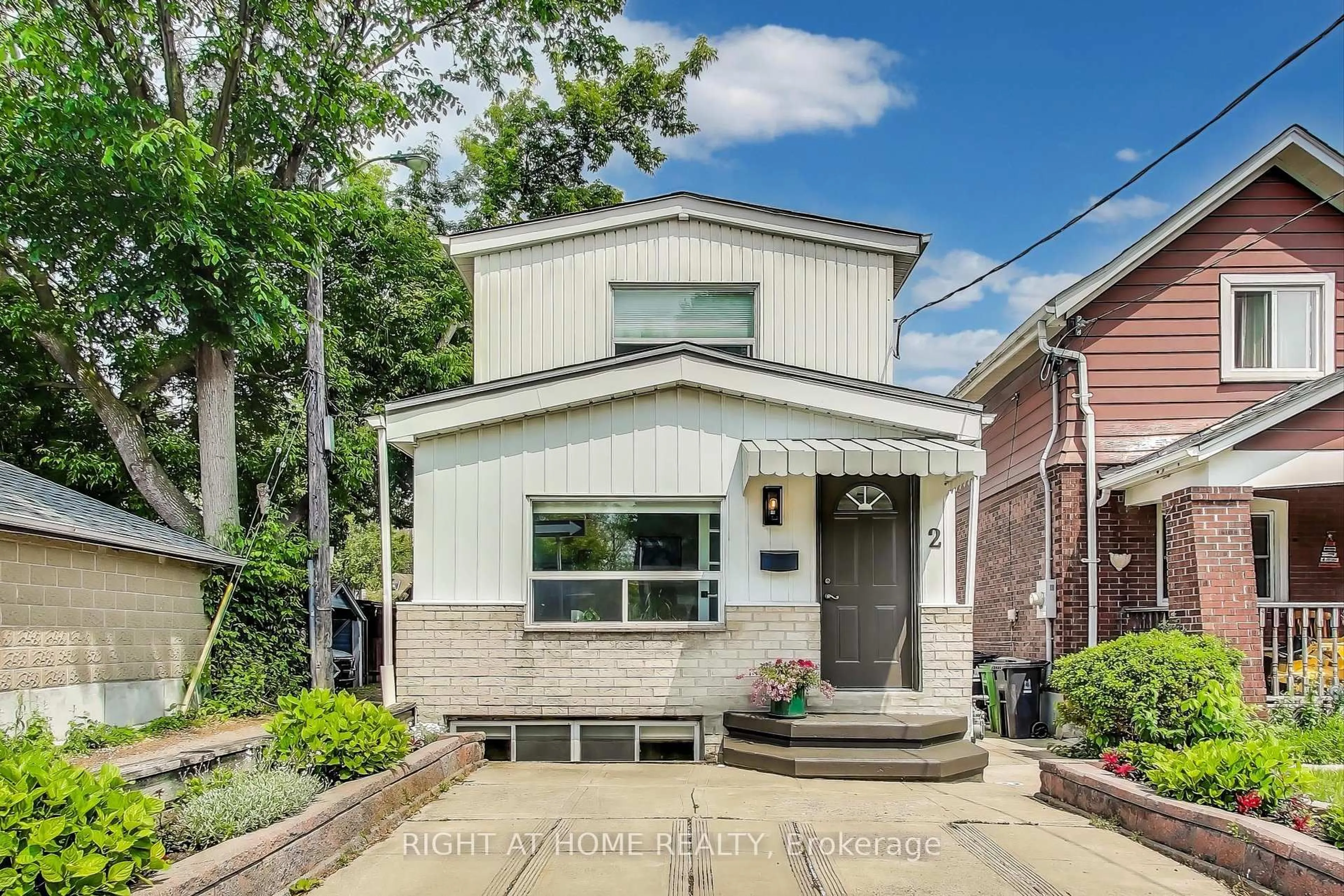 Home with brick exterior material, street for 2 sutherland Ave, Toronto Ontario M4C 1R9