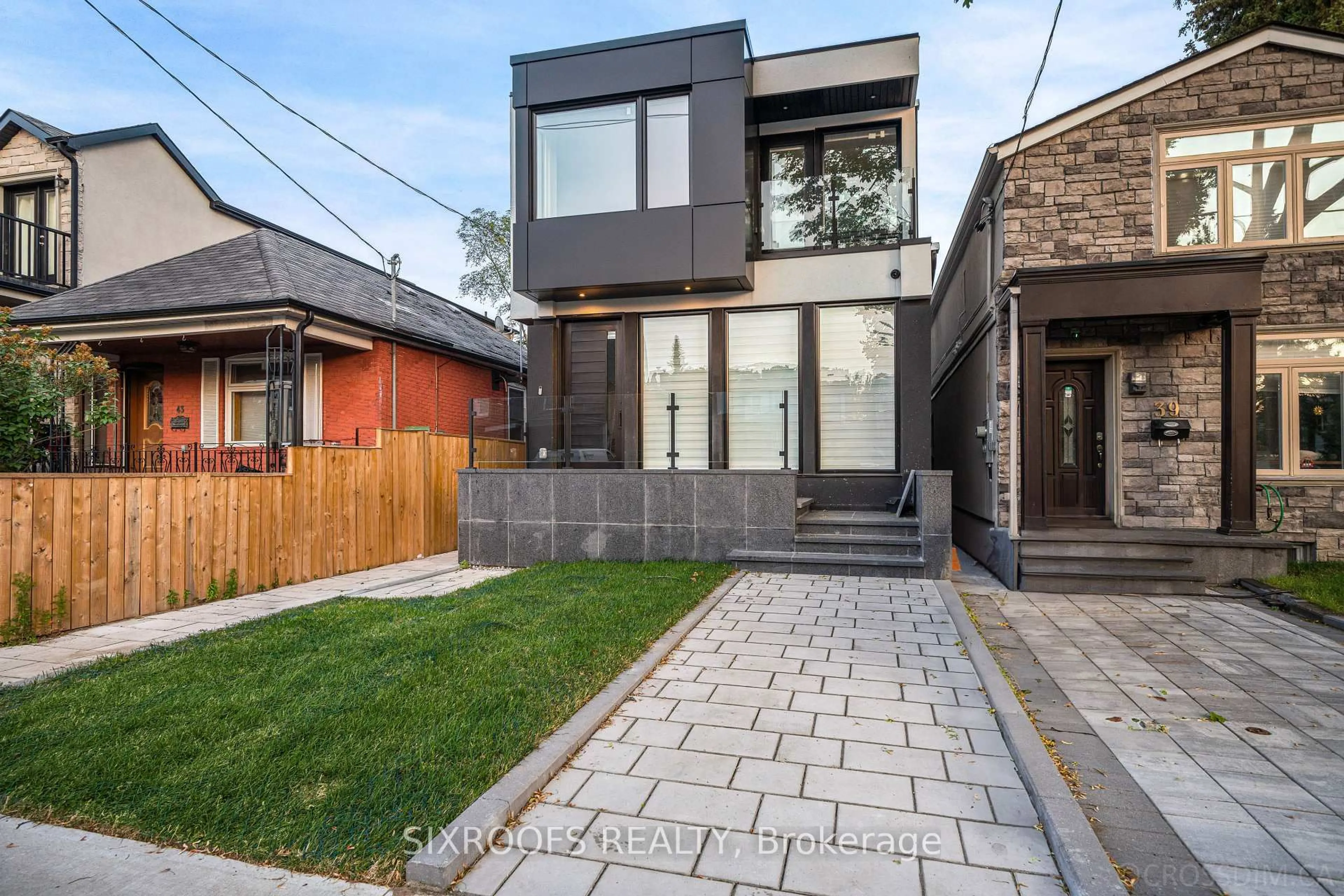 Home with brick exterior material, street for 41 Dunkirk Rd, Toronto Ontario M4C 2M4