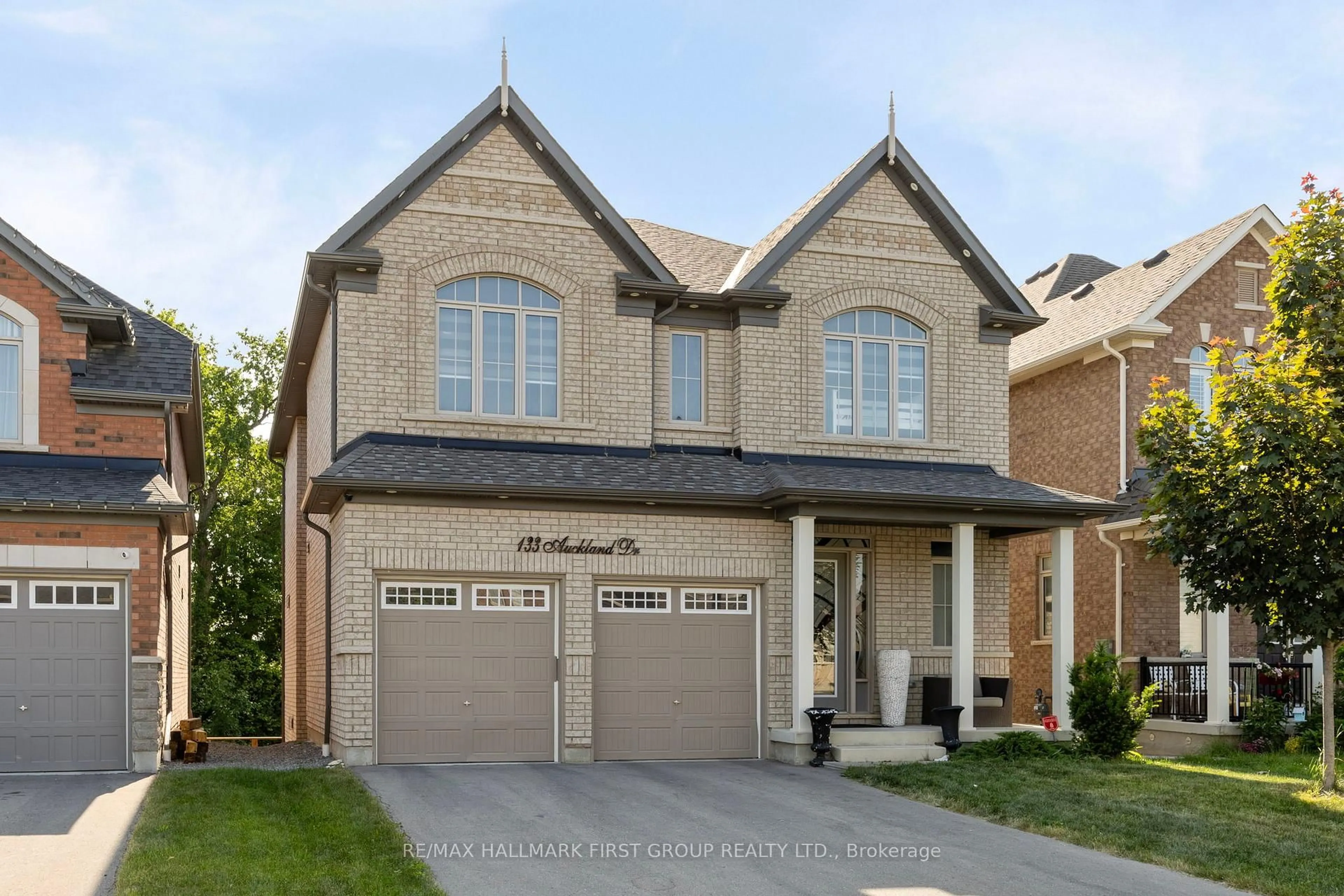 Home with brick exterior material, street for 133 Auckland Dr, Whitby Ontario L1P 0J4