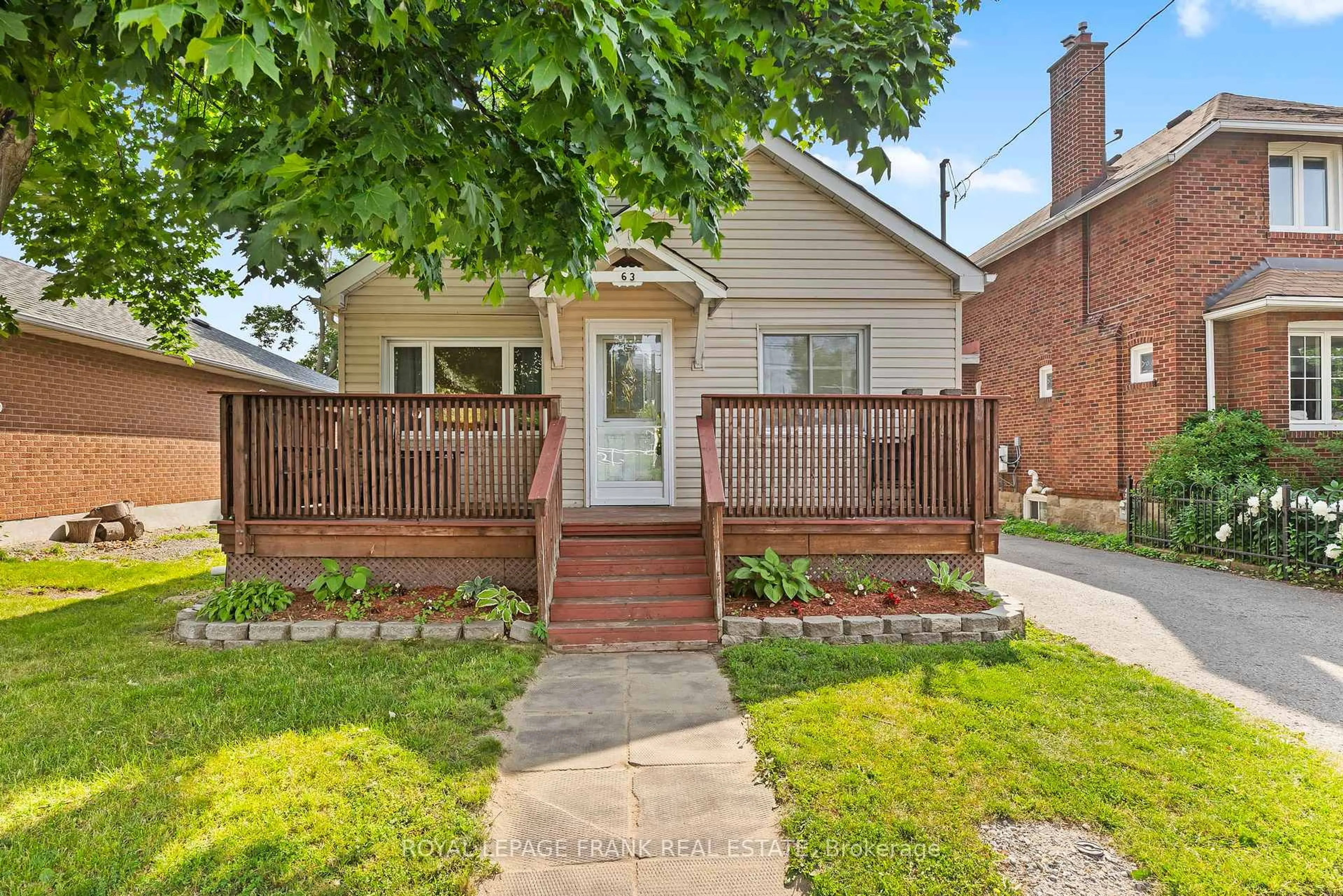 Home with brick exterior material, street for 63 Park Rd, Oshawa Ontario L1J 4K8