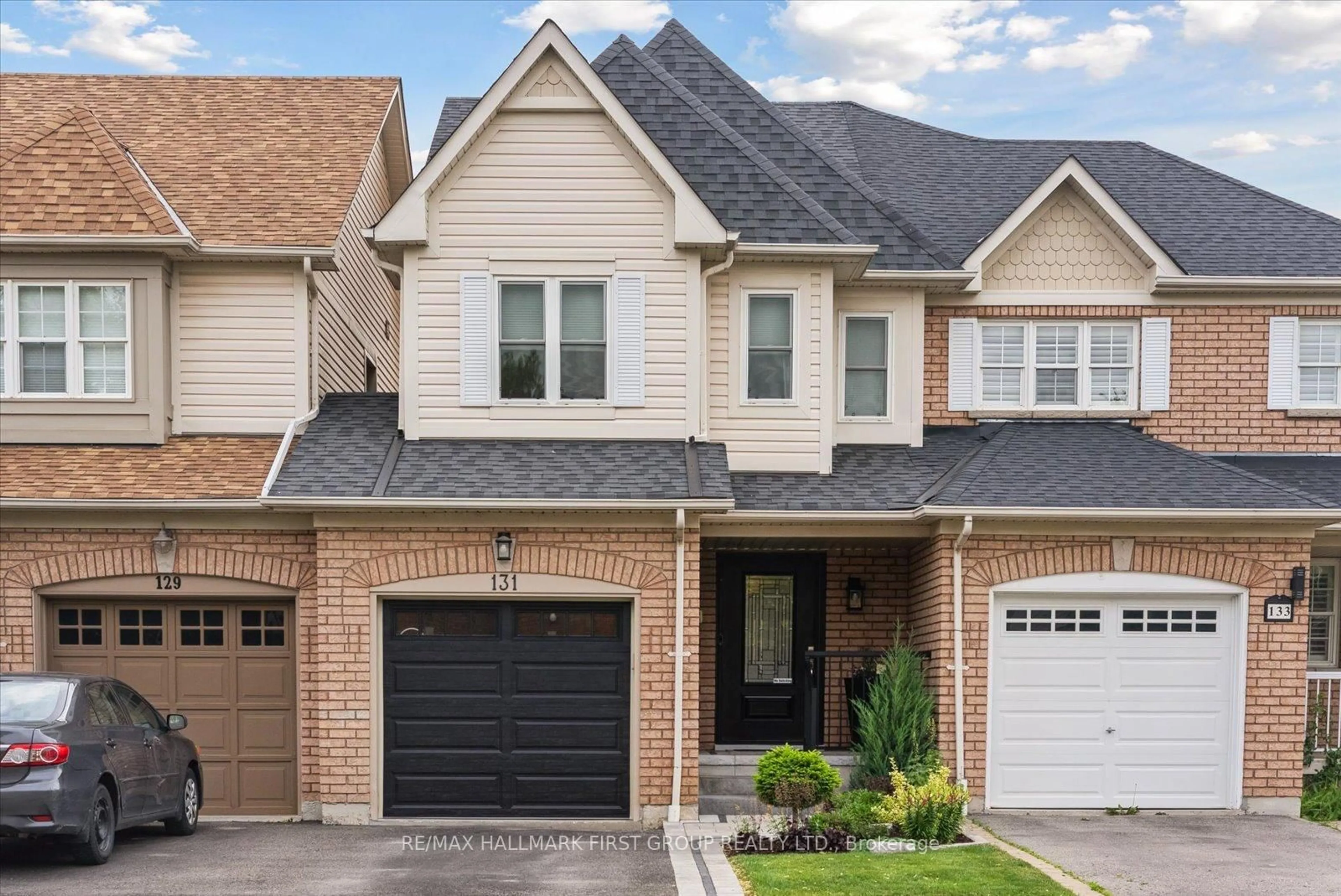 Home with brick exterior material, street for 131 Kirkland Pl, Whitby Ontario L1P 1W8