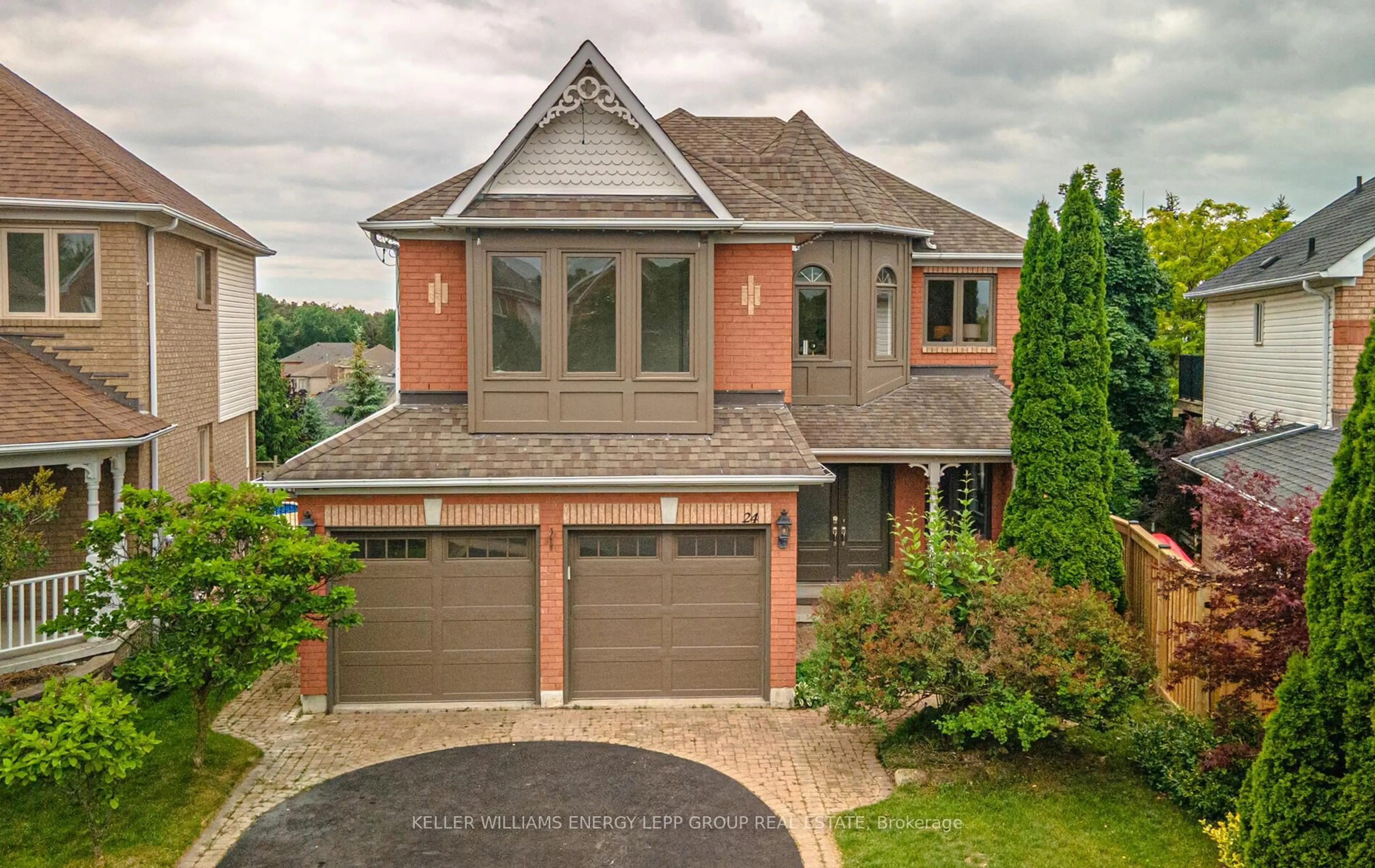 Home with brick exterior material, street for 24 Harness Ridge Dr, Whitby Ontario L1R 2P4