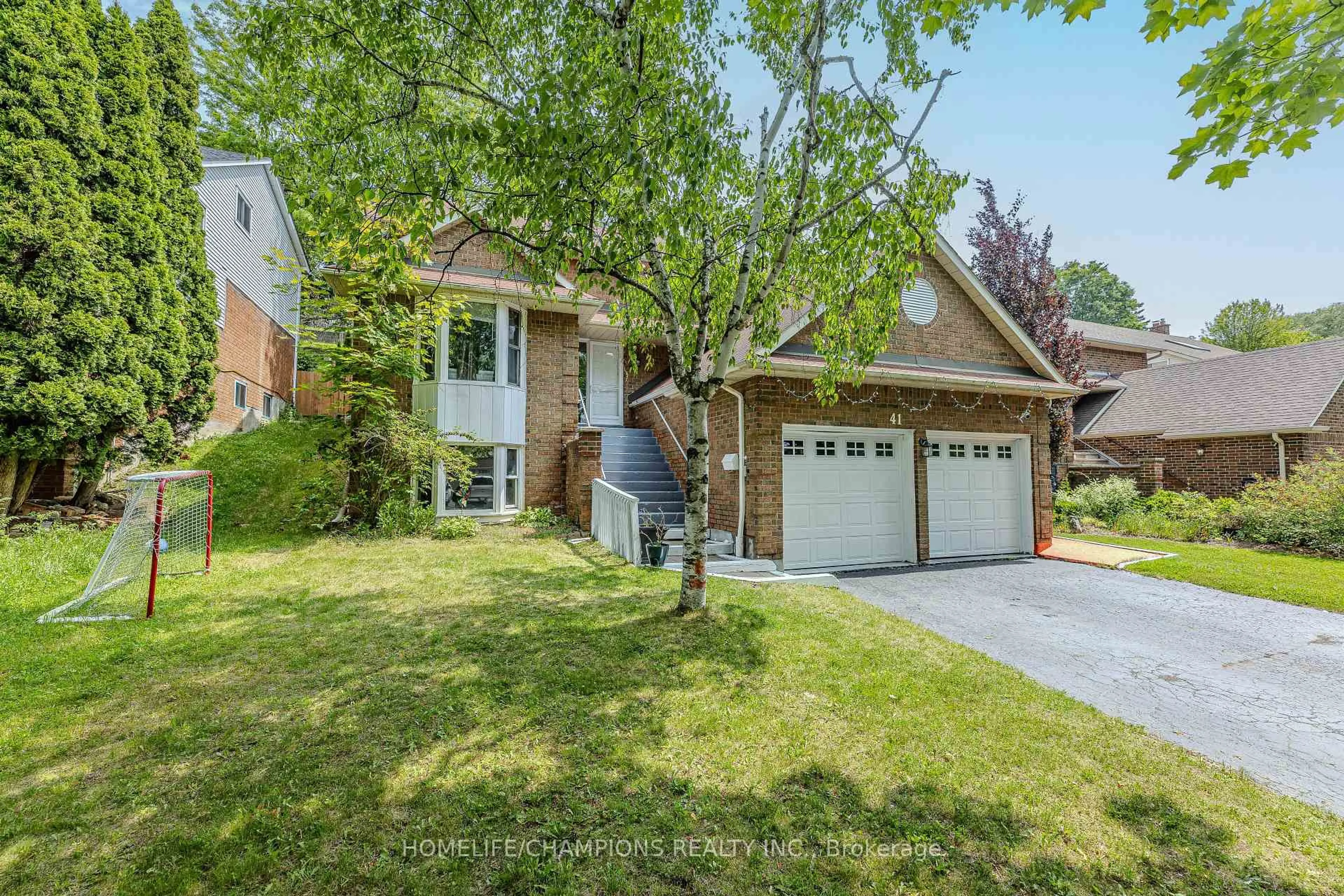 Home with vinyl exterior material, street for 41 Broadbridge Dr, Toronto Ontario M1C 3K5