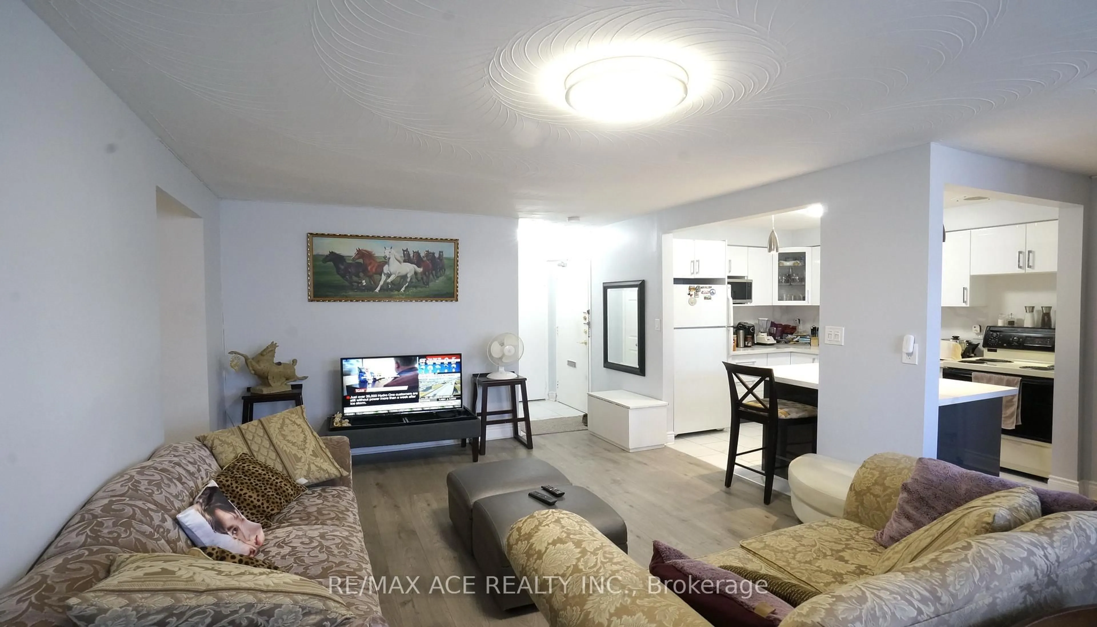 Living room with furniture, unknown for 825 Kennedy Rd #506, Toronto Ontario M1K 2E6
