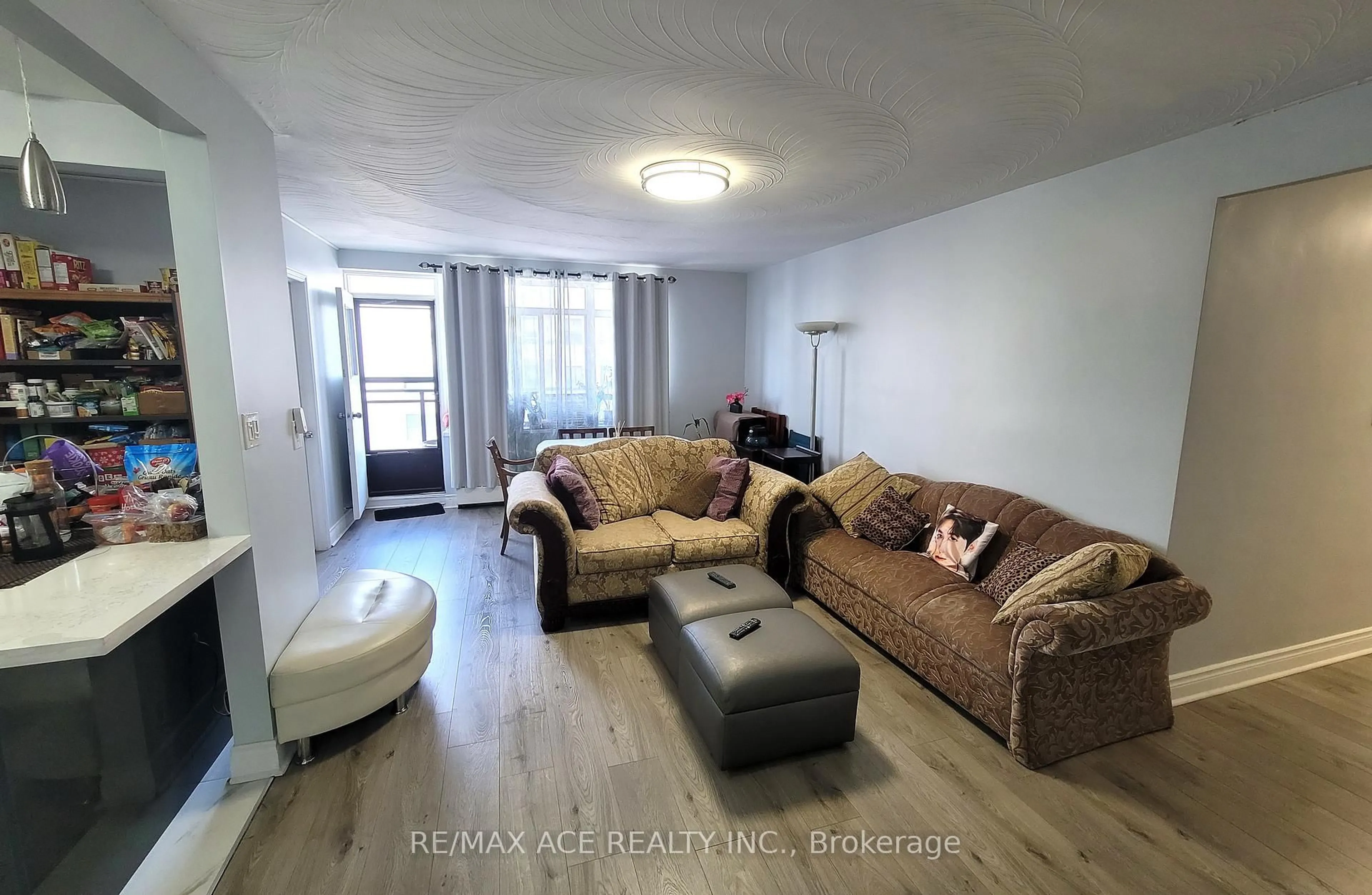 Living room with furniture, unknown for 825 Kennedy Rd #506, Toronto Ontario M1K 2E6