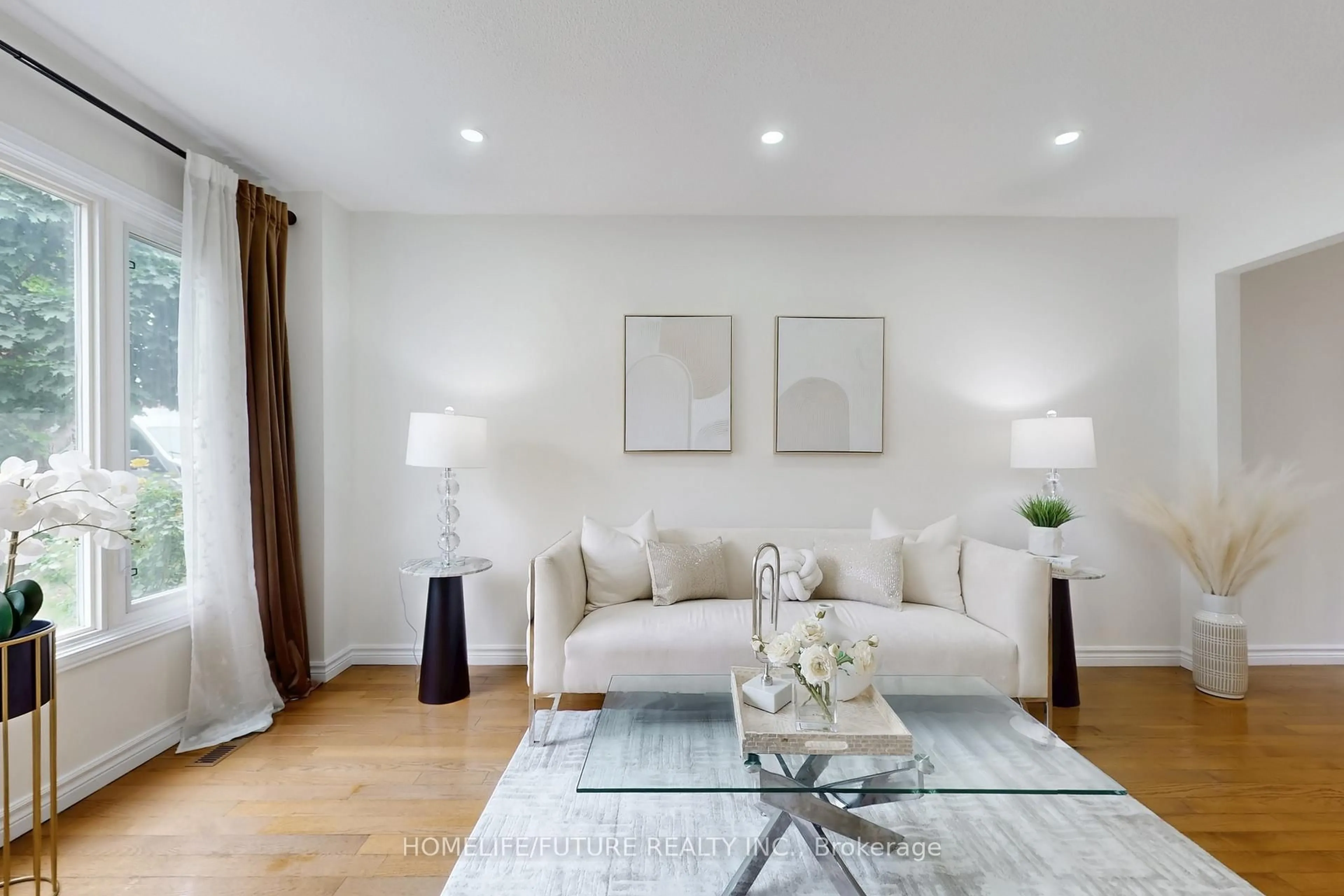 Living room with furniture, wood/laminate floor for 75 Calverley Tr, Toronto Ontario M1C 3S5