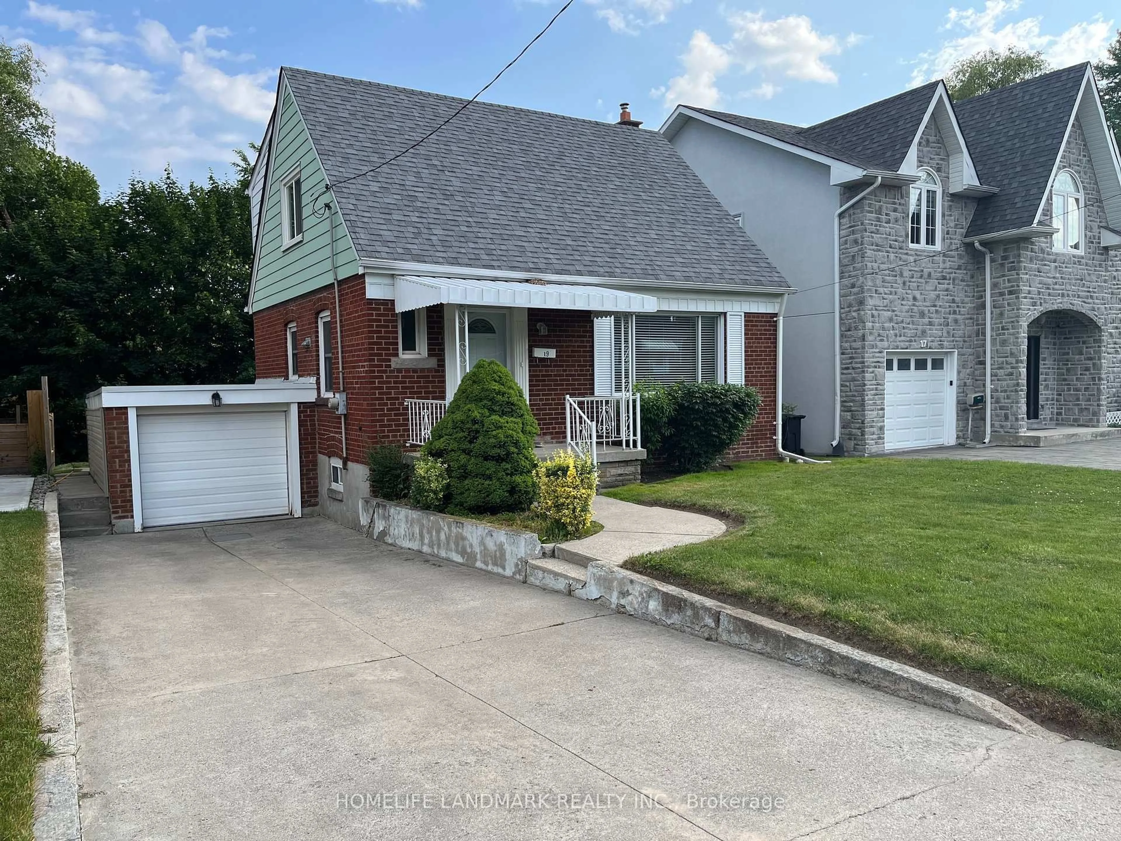Home with brick exterior material, street for 19 Southmead Rd, Toronto Ontario M1L 2H7