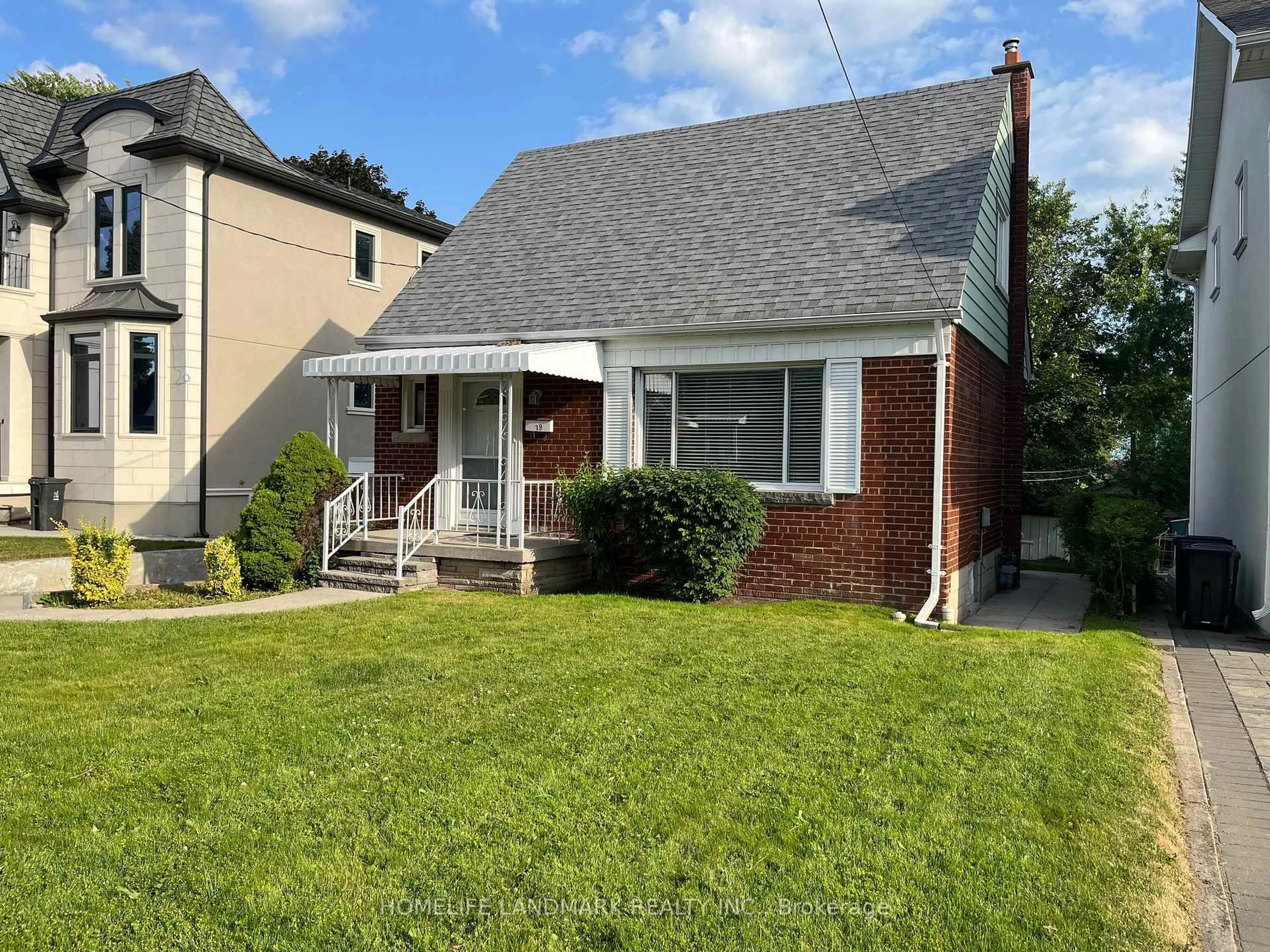 Home with vinyl exterior material, street for 19 Southmead Rd, Toronto Ontario M1L 2H7
