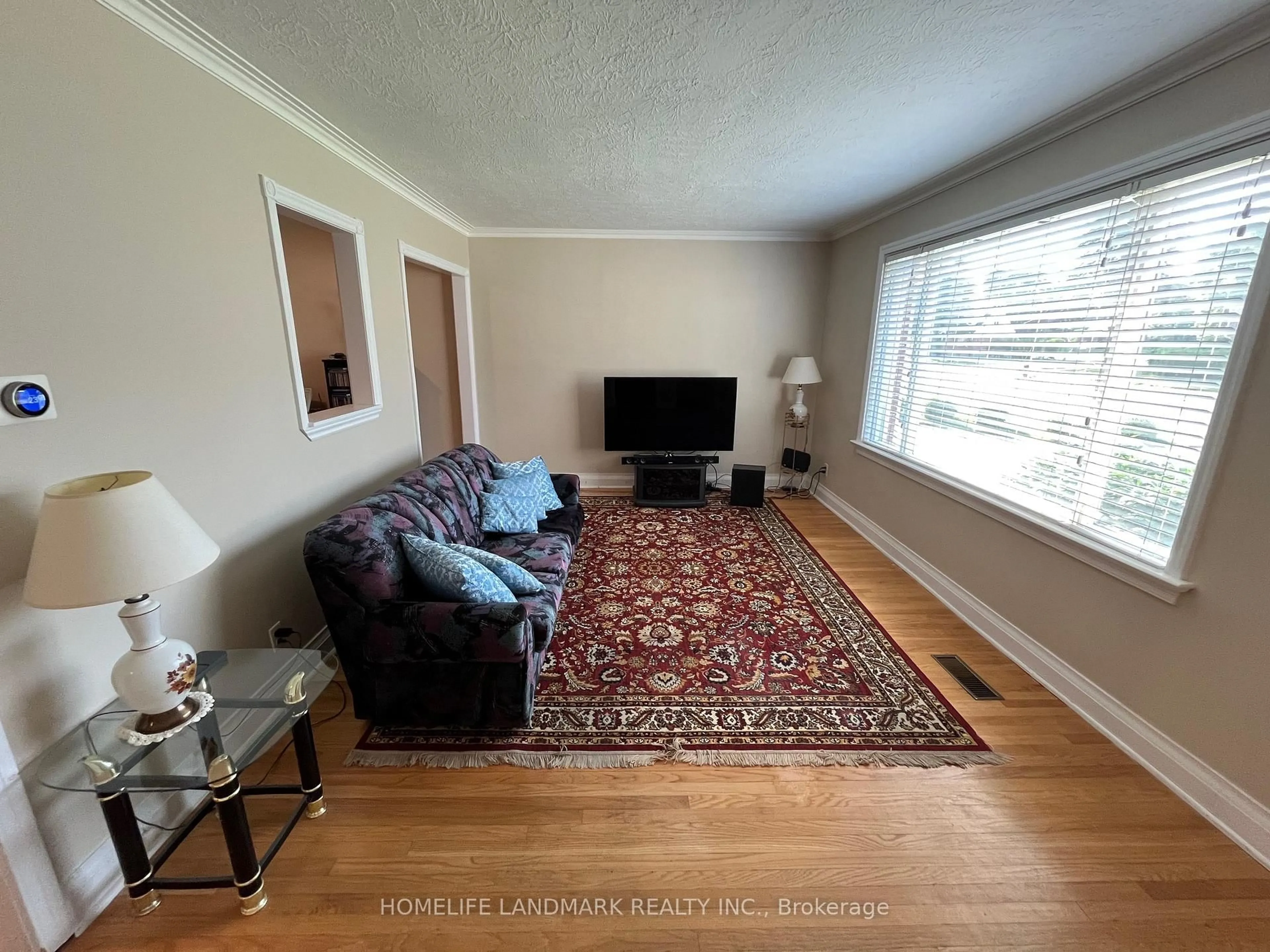 Living room with furniture, unknown for 19 Southmead Rd, Toronto Ontario M1L 2H7