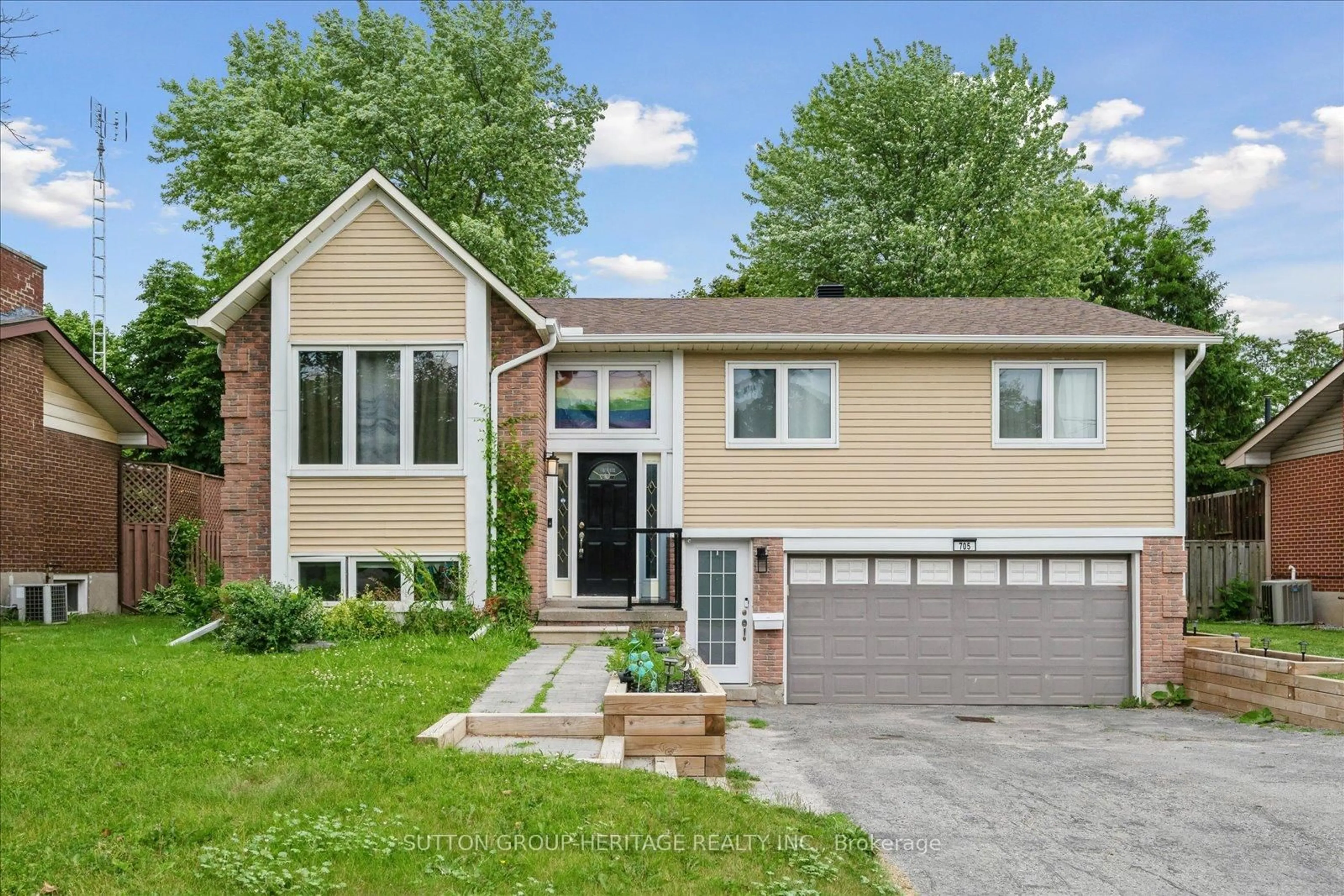 Home with vinyl exterior material, street for 705 Anderson St, Whitby Ontario L1N 3W1