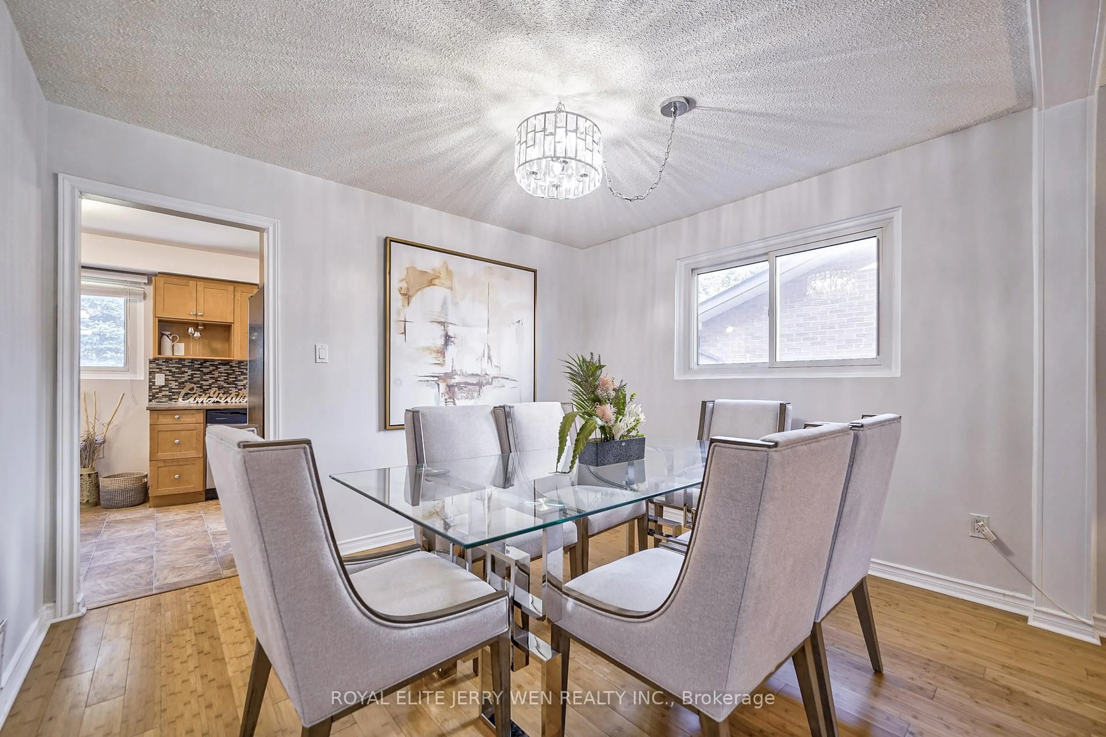 Dining room, wood/laminate floor for 8 Deerfield Crt, Whitby Ontario L1N 5V1