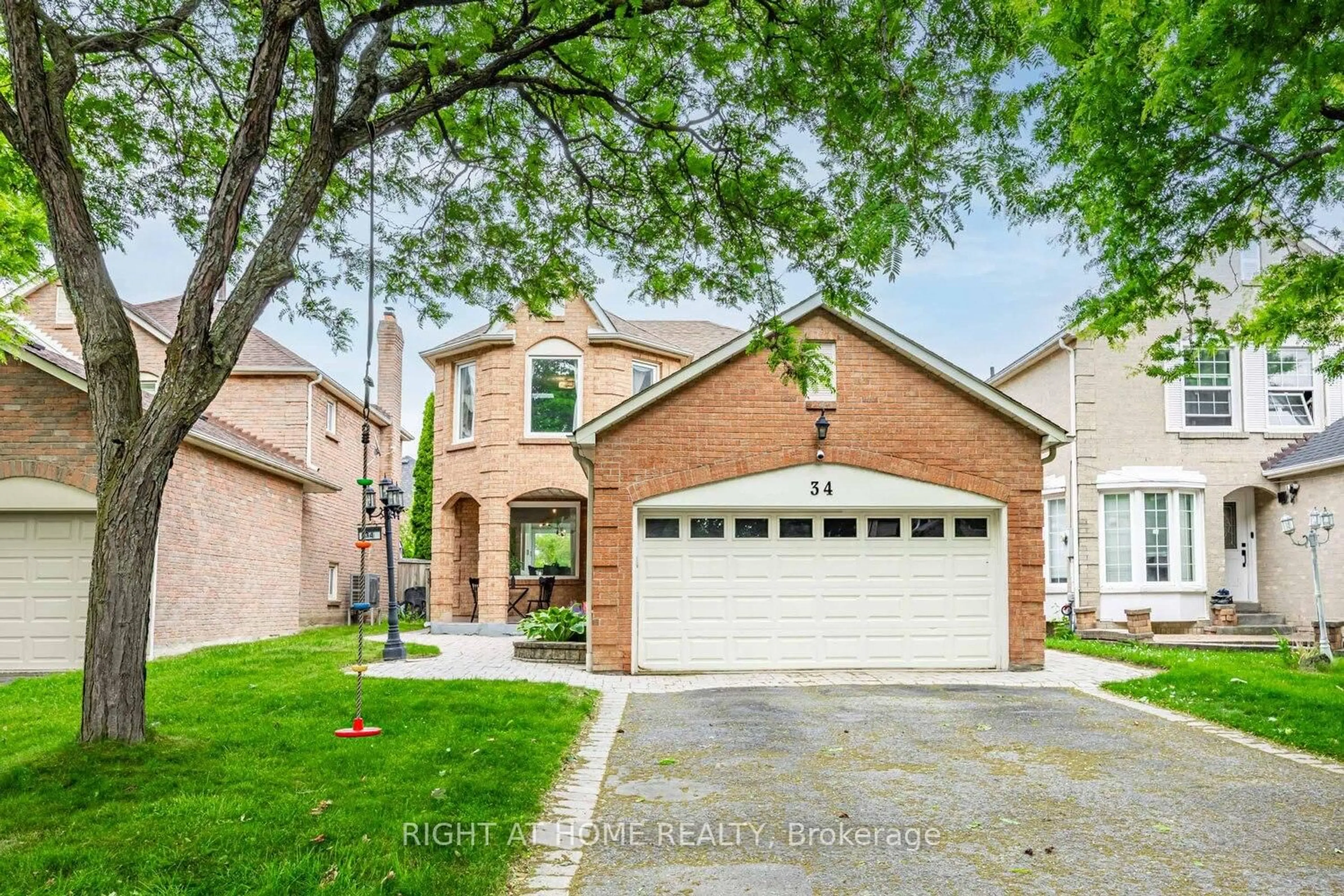 Home with brick exterior material, street for 34 Beaumont Dr, Ajax Ontario L1T 1P8