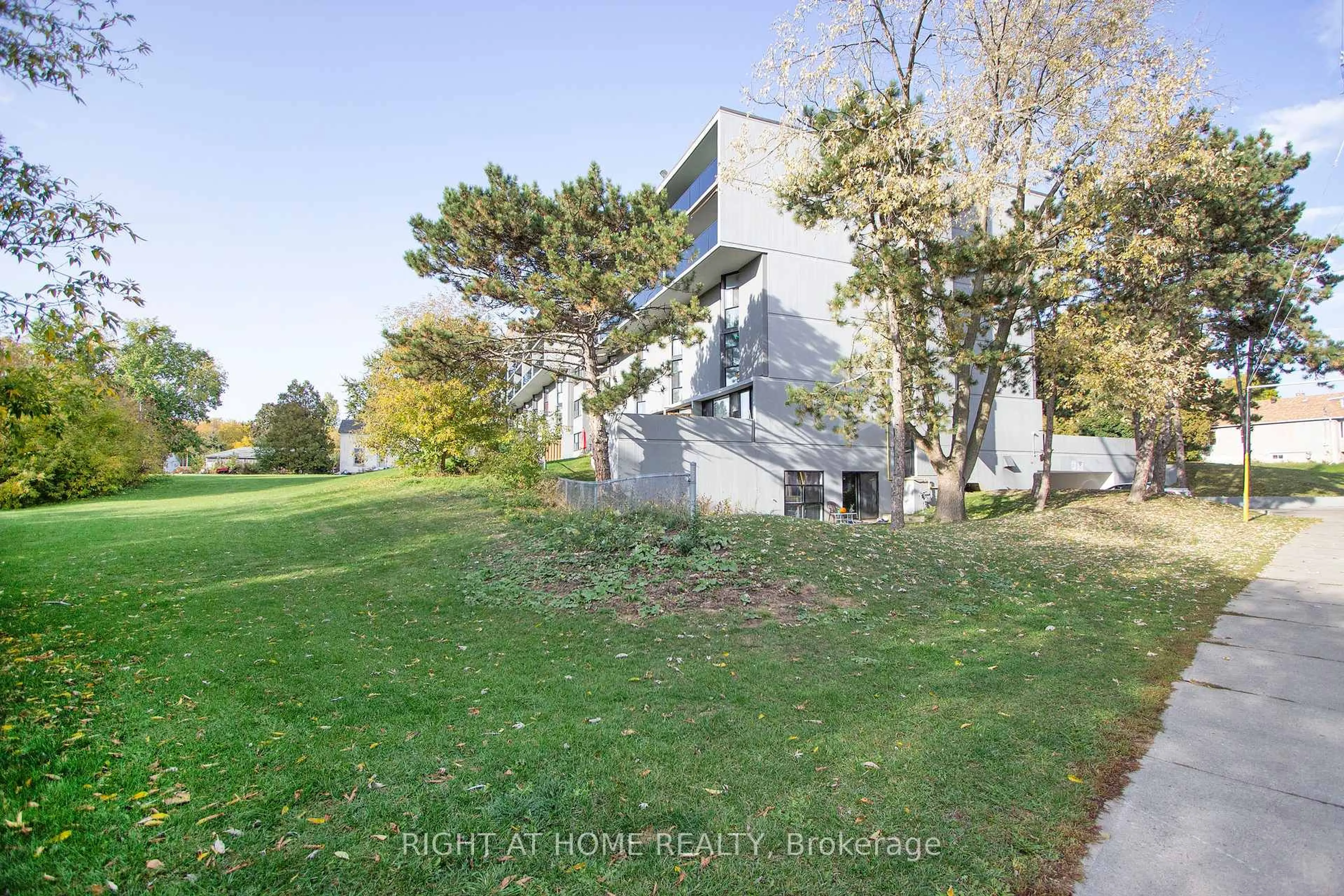 A pic from outside/outdoor area/front of a property/back of a property/a pic from drone, unknown for 454 Centre St #110, Oshawa Ontario L1H 4C2