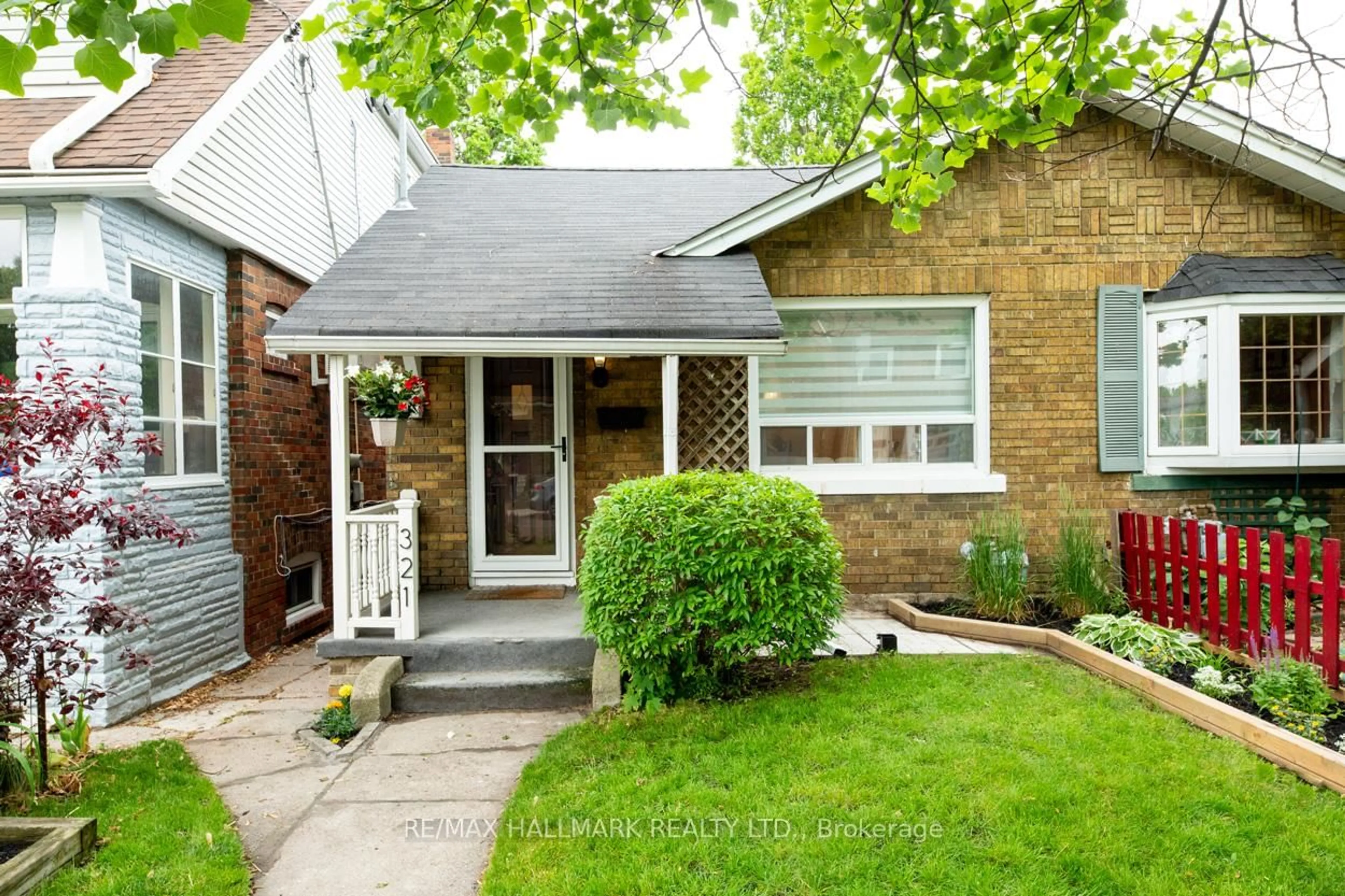Home with brick exterior material, street for 321 Victoria Park Ave, Toronto Ontario M4E 3S7