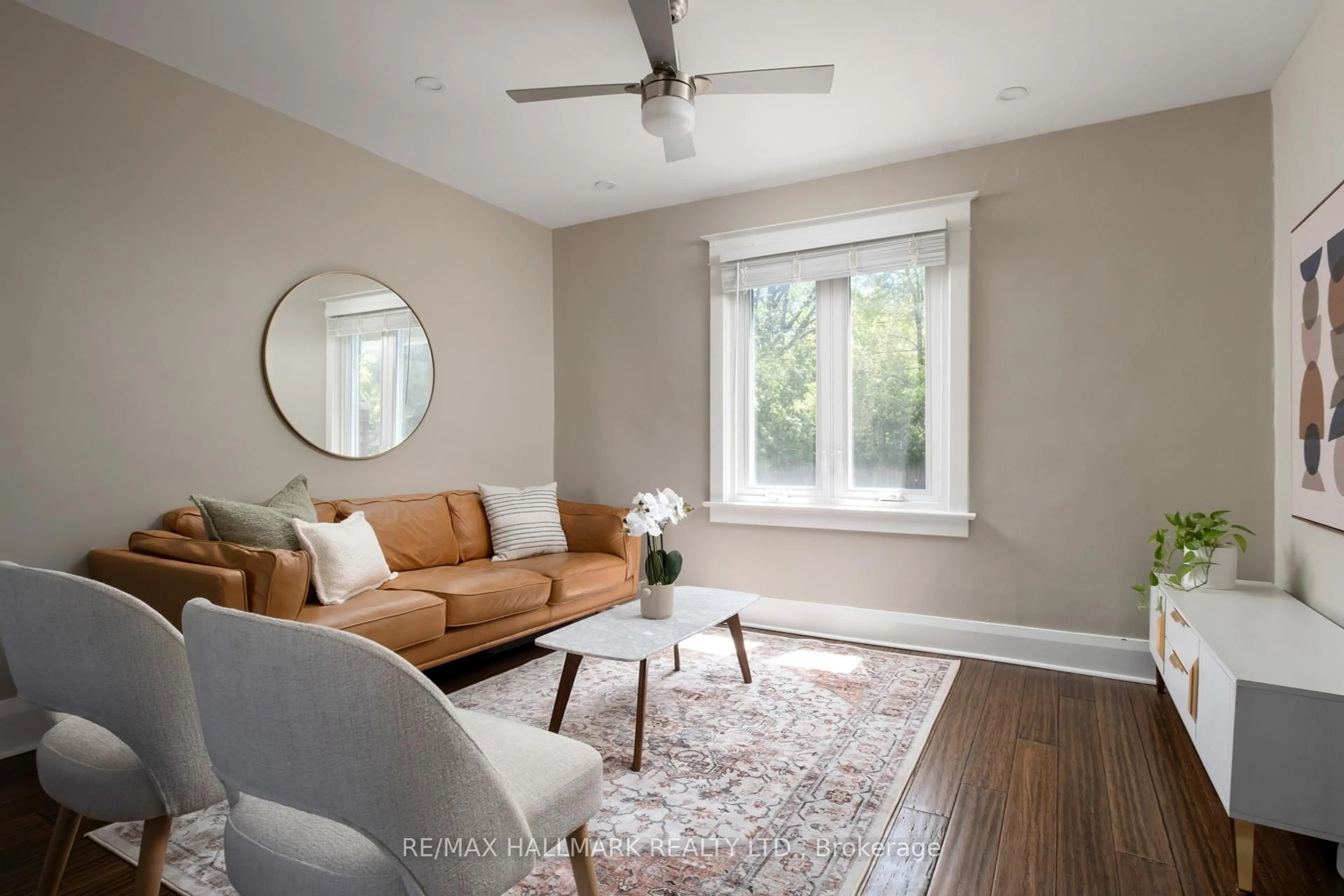 Living room with furniture, unknown for 2a Midburn Ave, Toronto Ontario M4C 2C9