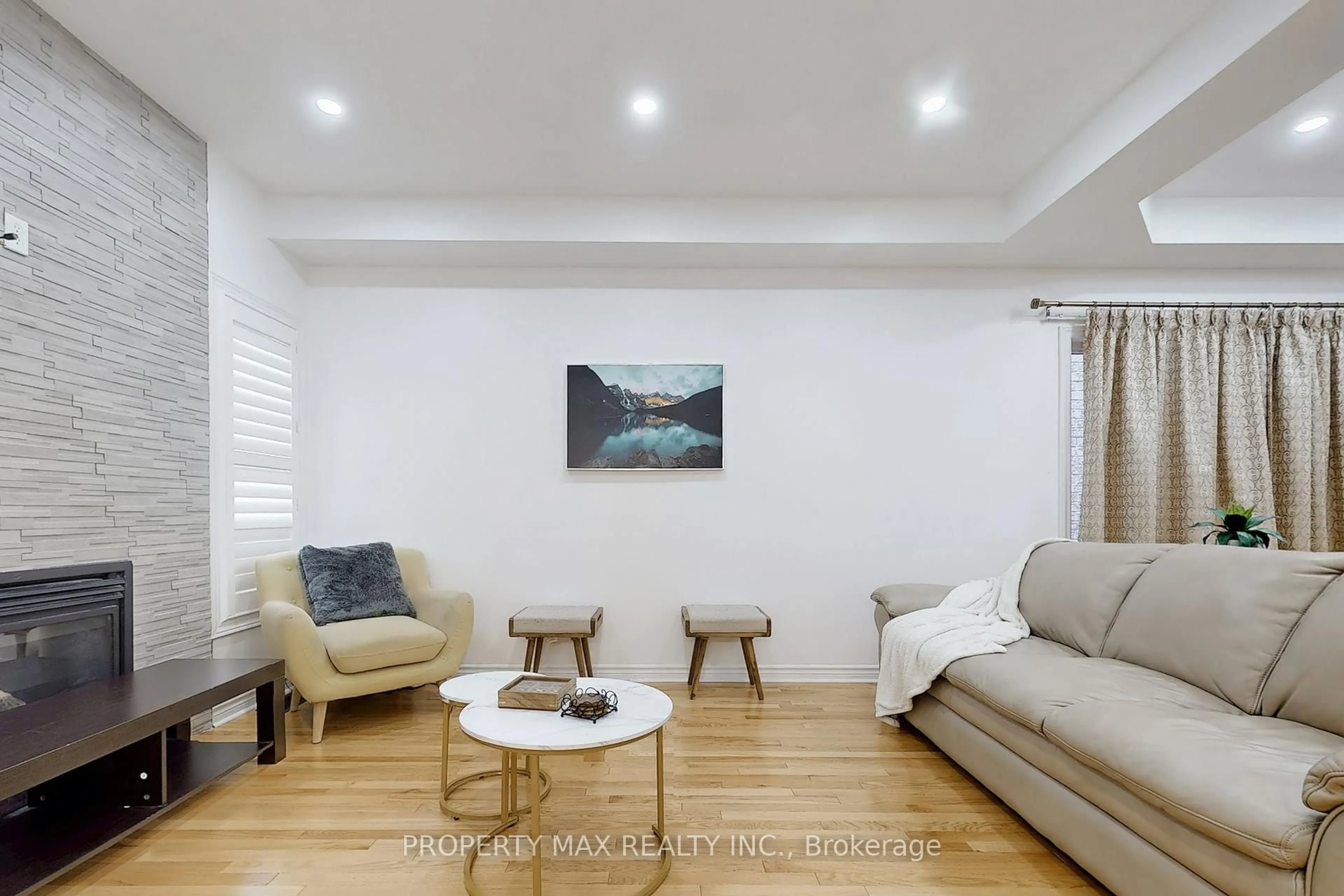 Living room with furniture, wood/laminate floor for 1577 Brandy Crt, Pickering Ontario L1X 0C8