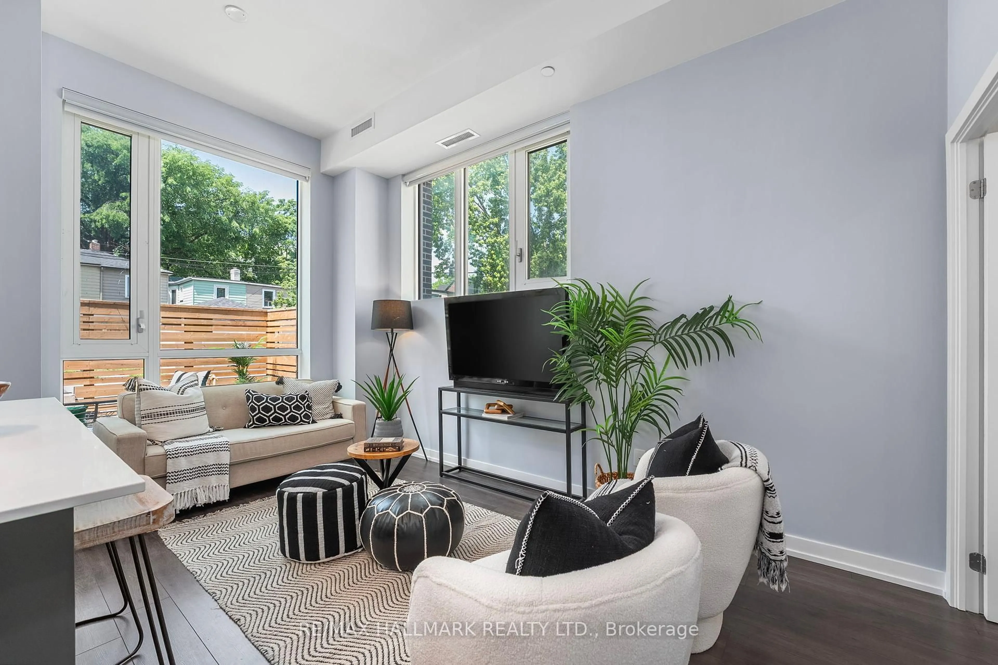 Living room with furniture, unknown for 150 Logan Ave #124, Toronto Ontario M4M 0E4