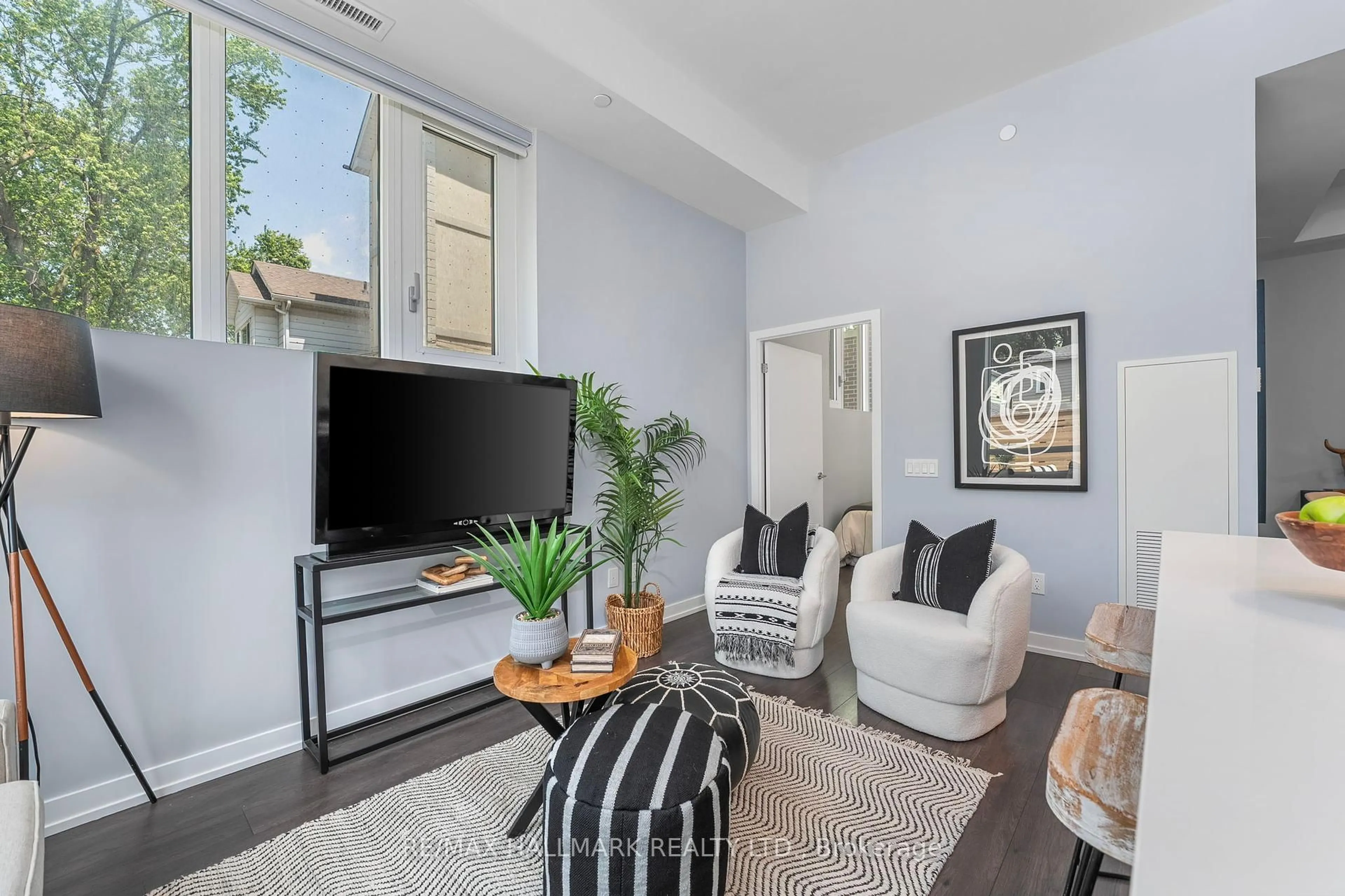 Living room with furniture, unknown for 150 Logan Ave #124, Toronto Ontario M4M 0E4