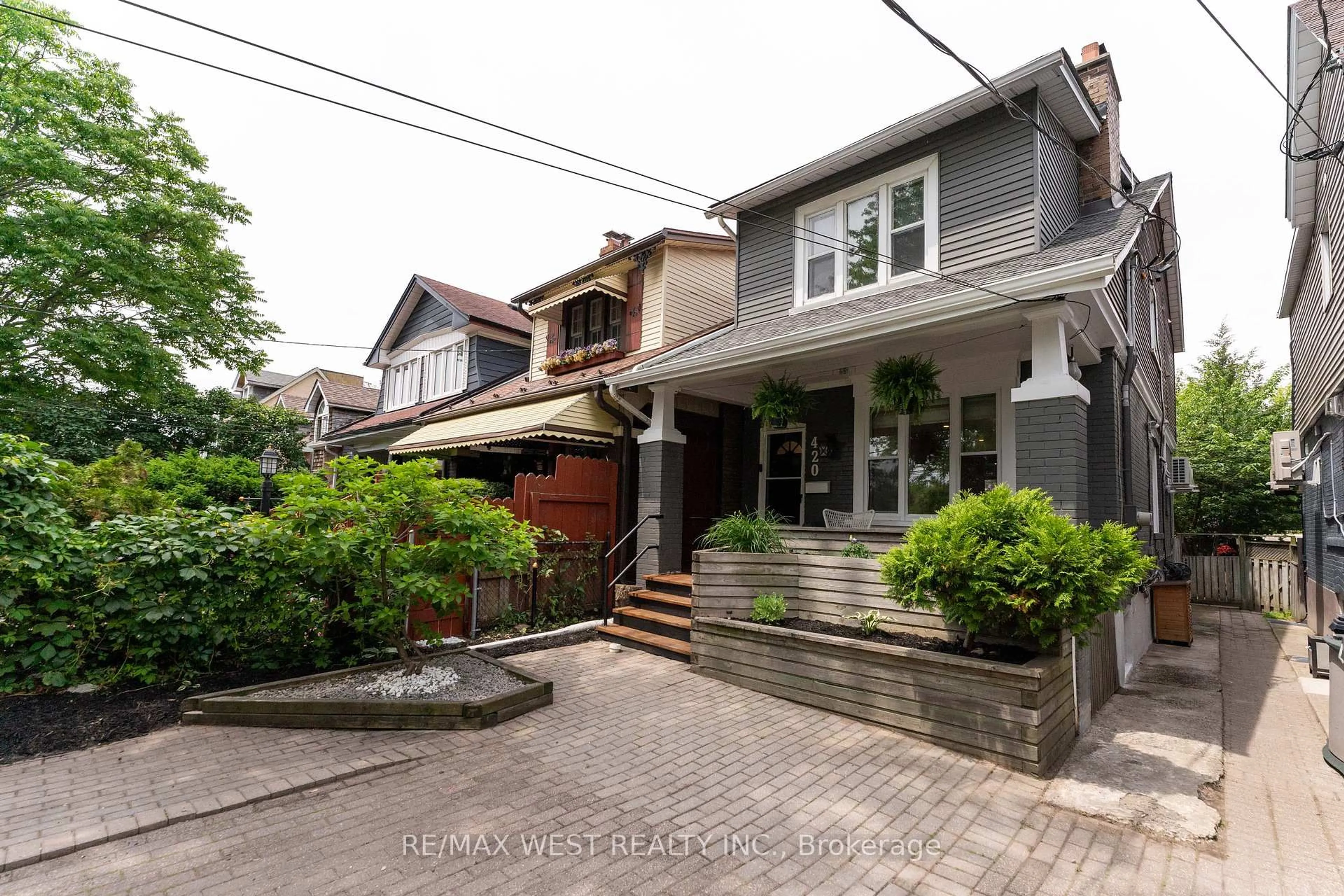 Home with brick exterior material, street for 420 Kingston Rd, Toronto Ontario M4L 1T9
