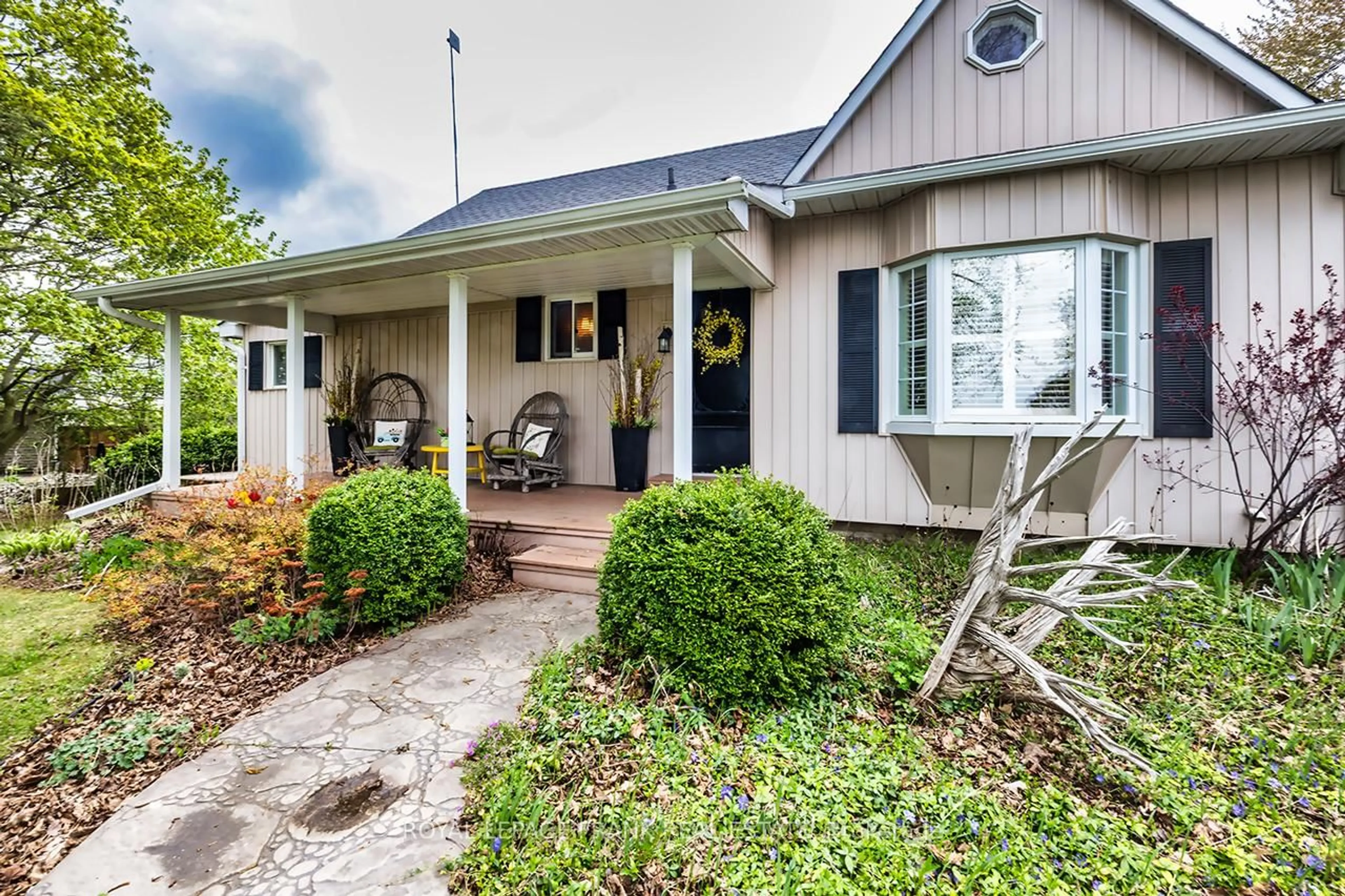 Home with vinyl exterior material, street for 1361 Highway 7A, Scugog Ontario L9L 1B5