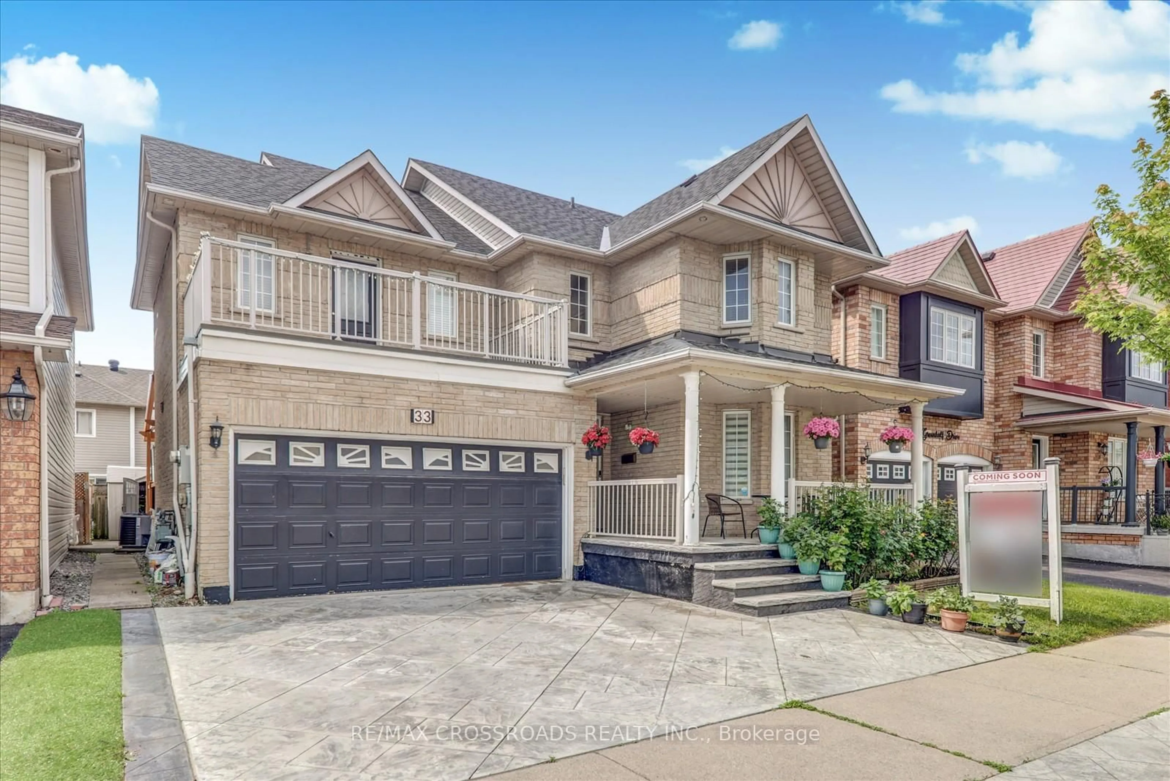 Home with brick exterior material, street for 33 Greenhalf Dr, Ajax Ontario L1S 7N7