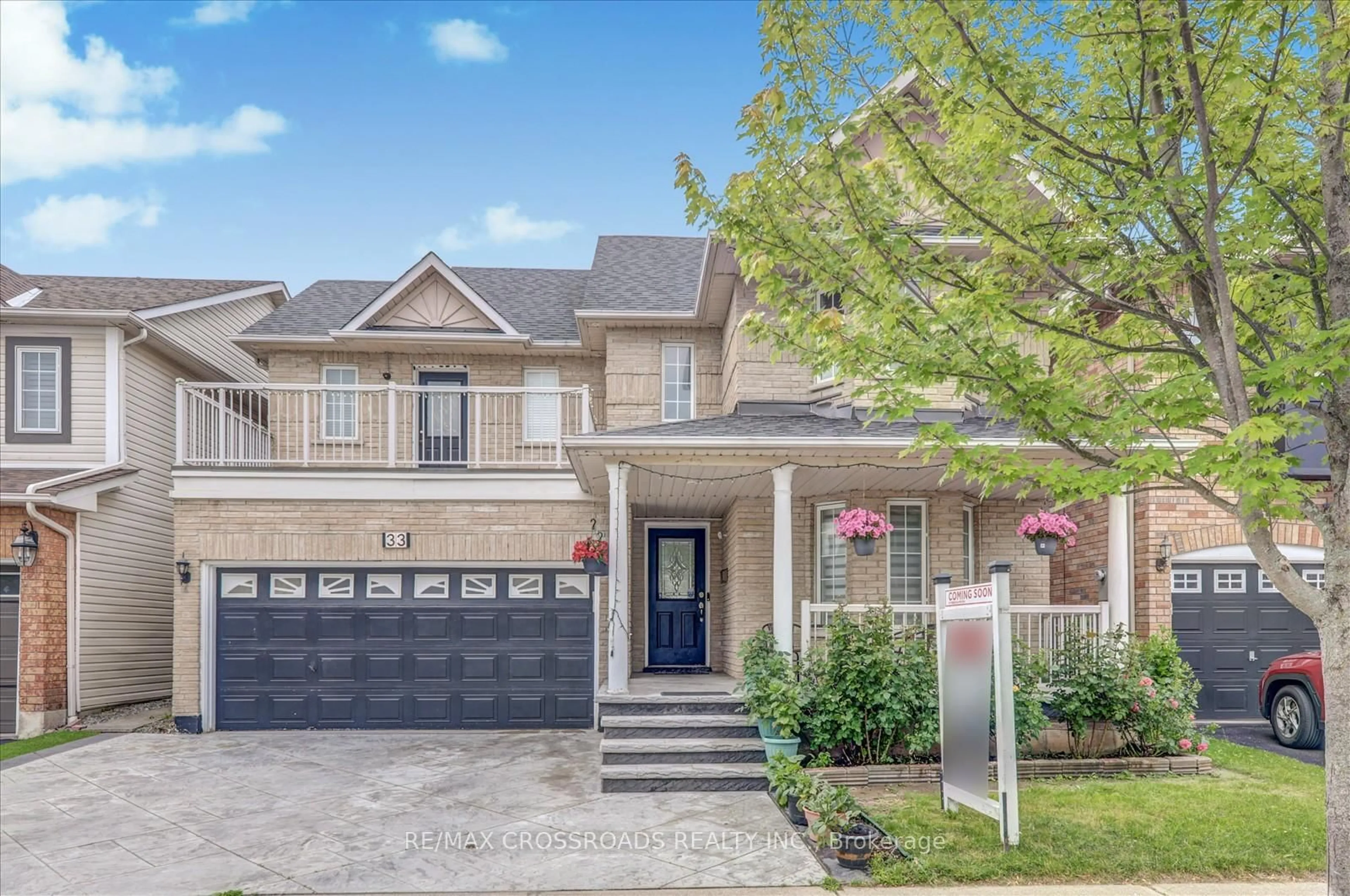 Home with brick exterior material, street for 33 Greenhalf Dr, Ajax Ontario L1S 7N7