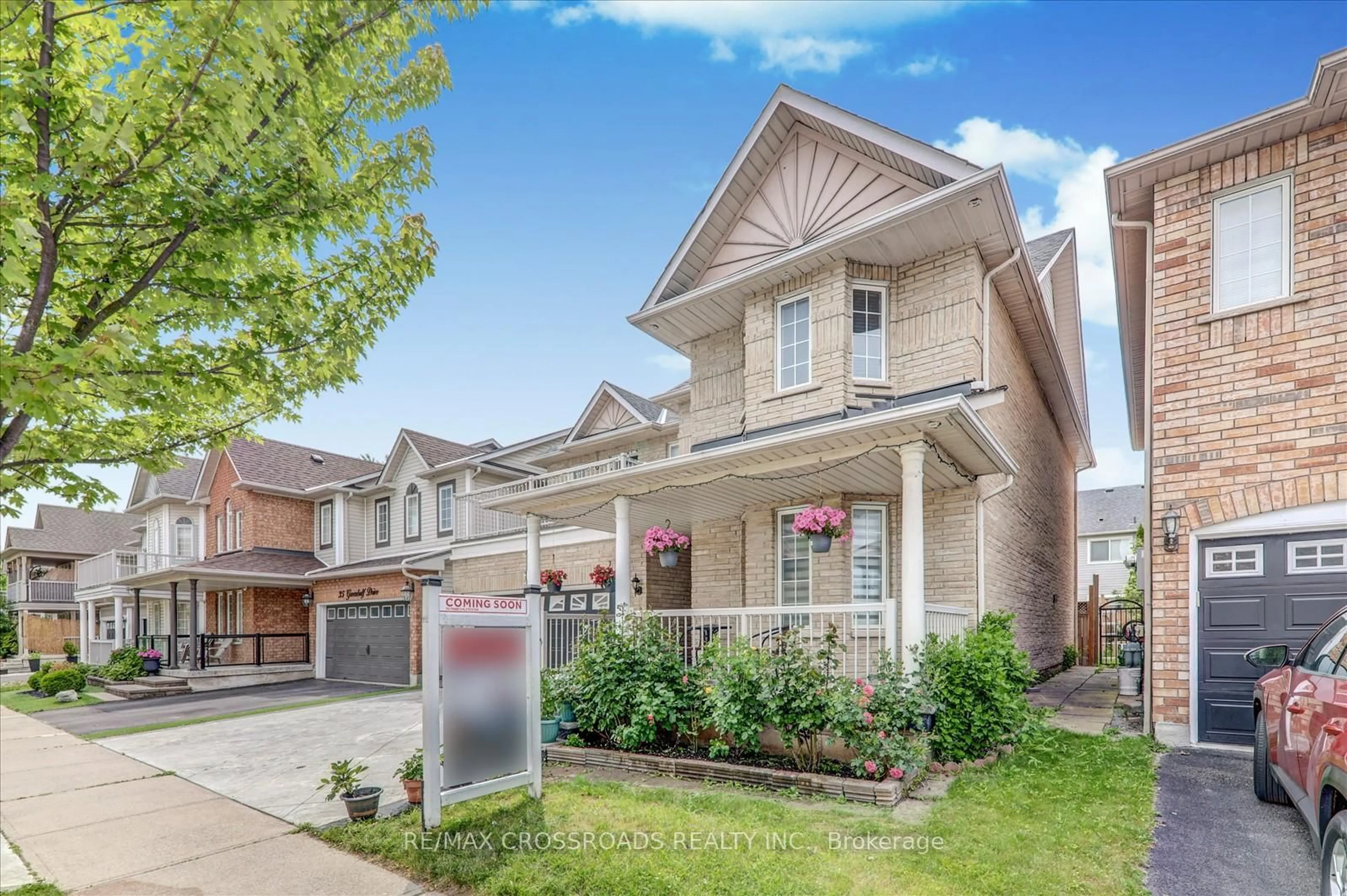 Home with brick exterior material, street for 33 Greenhalf Dr, Ajax Ontario L1S 7N7