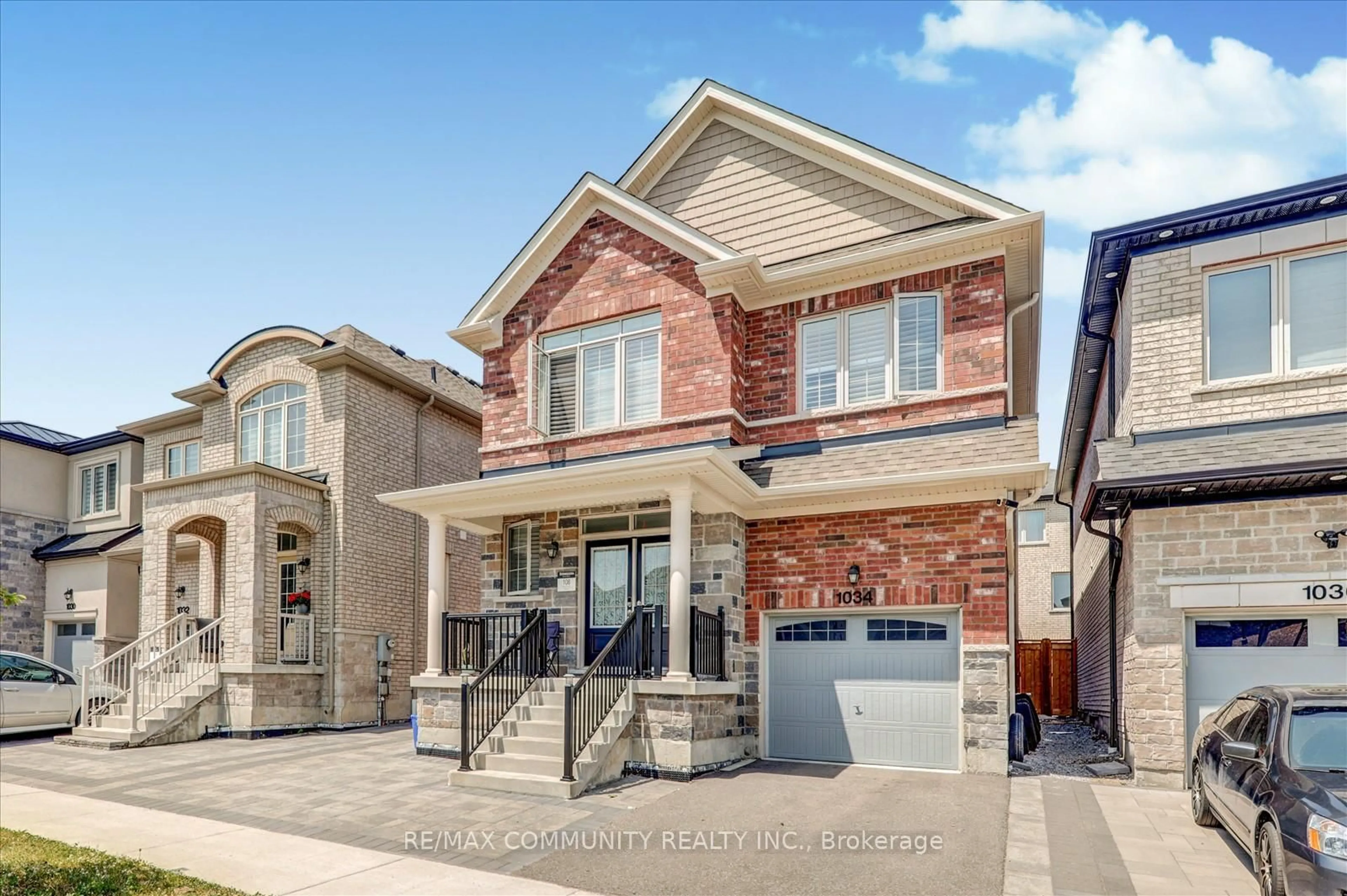 Home with brick exterior material, street for 1034 Pelican Tr, Pickering Ontario L1X 0G7