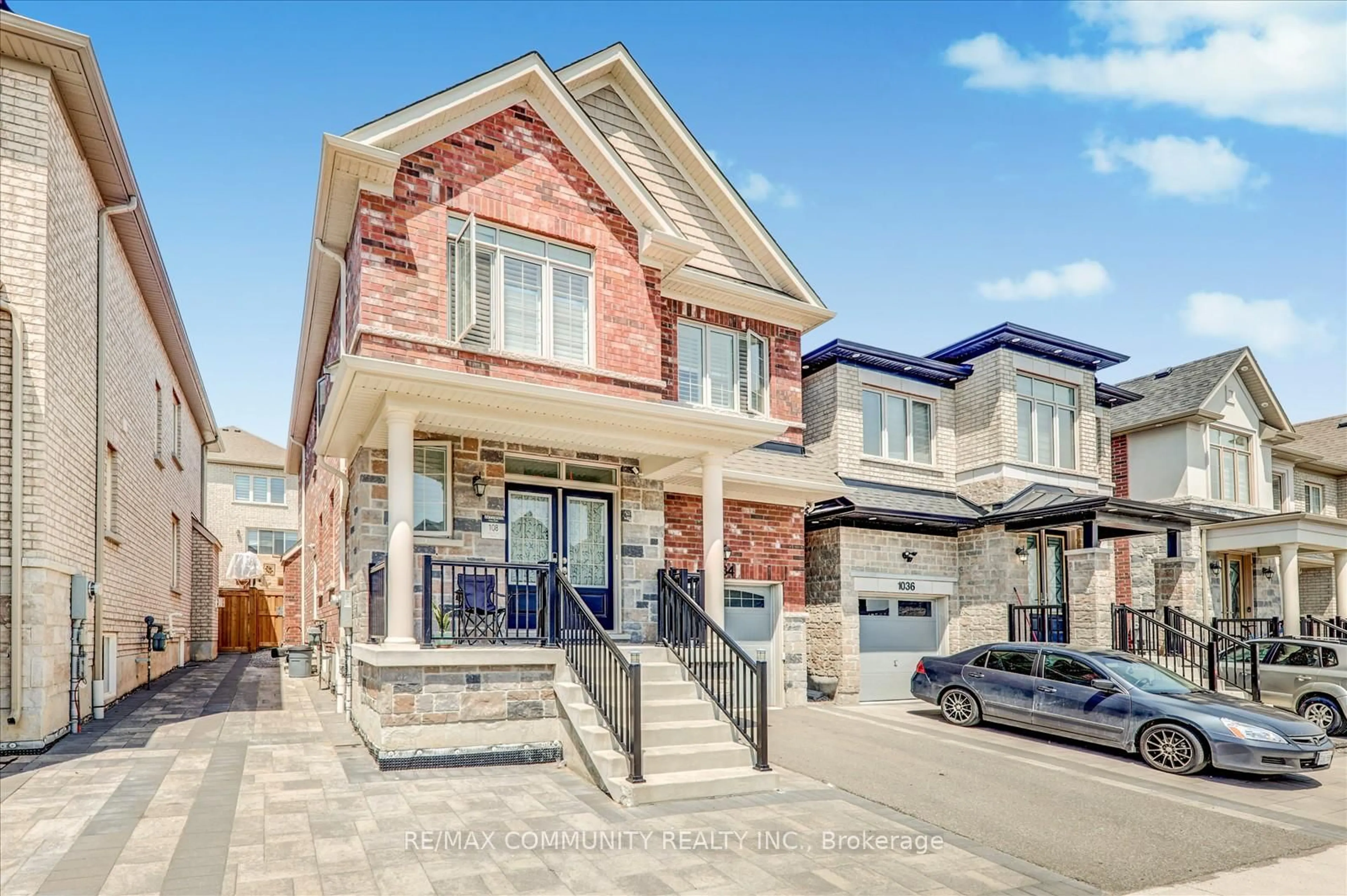 Home with brick exterior material, street for 1034 Pelican Tr, Pickering Ontario L1X 0G7