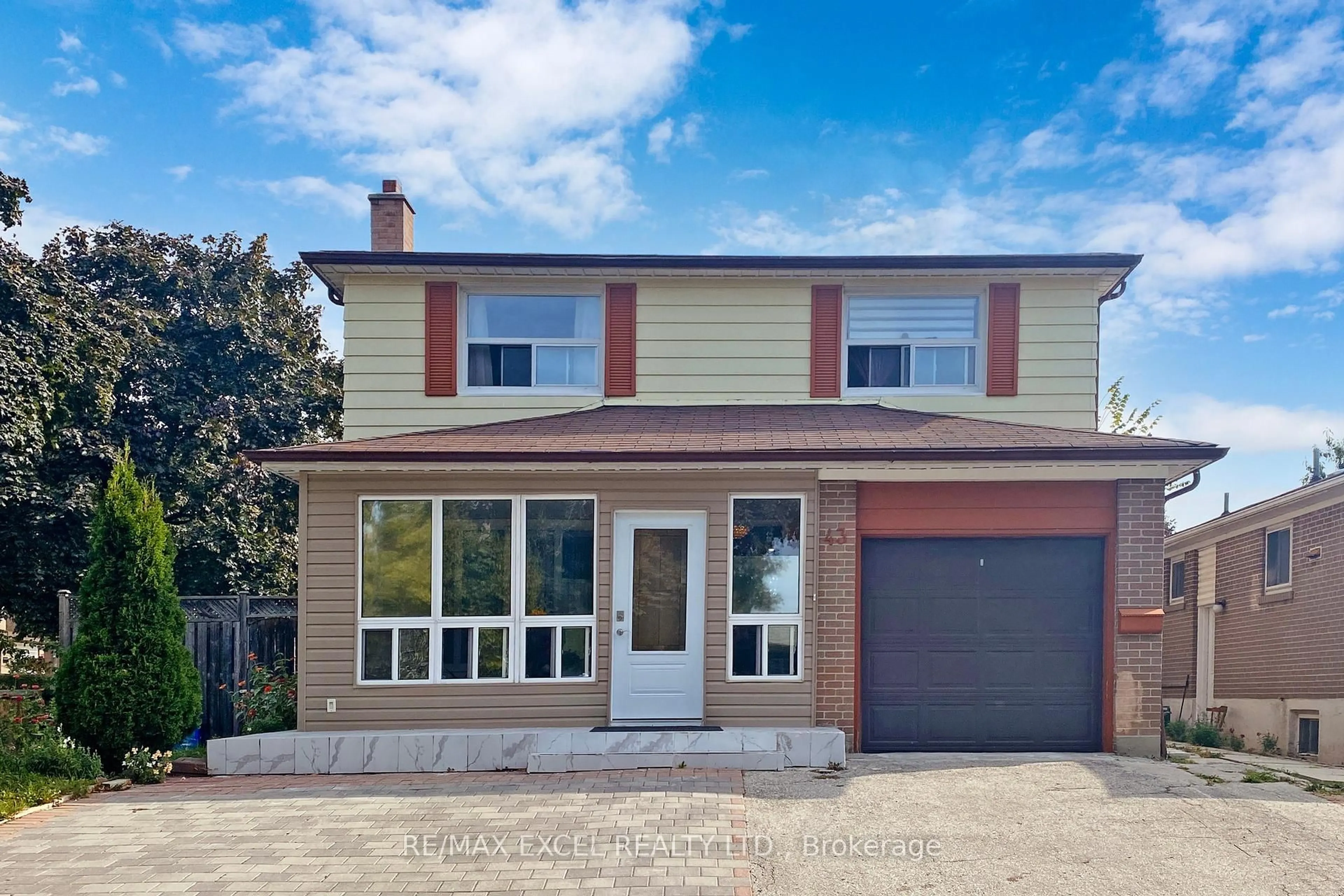 Home with brick exterior material, street for 43 Sonmore Dr, Toronto Ontario M1S 1X3