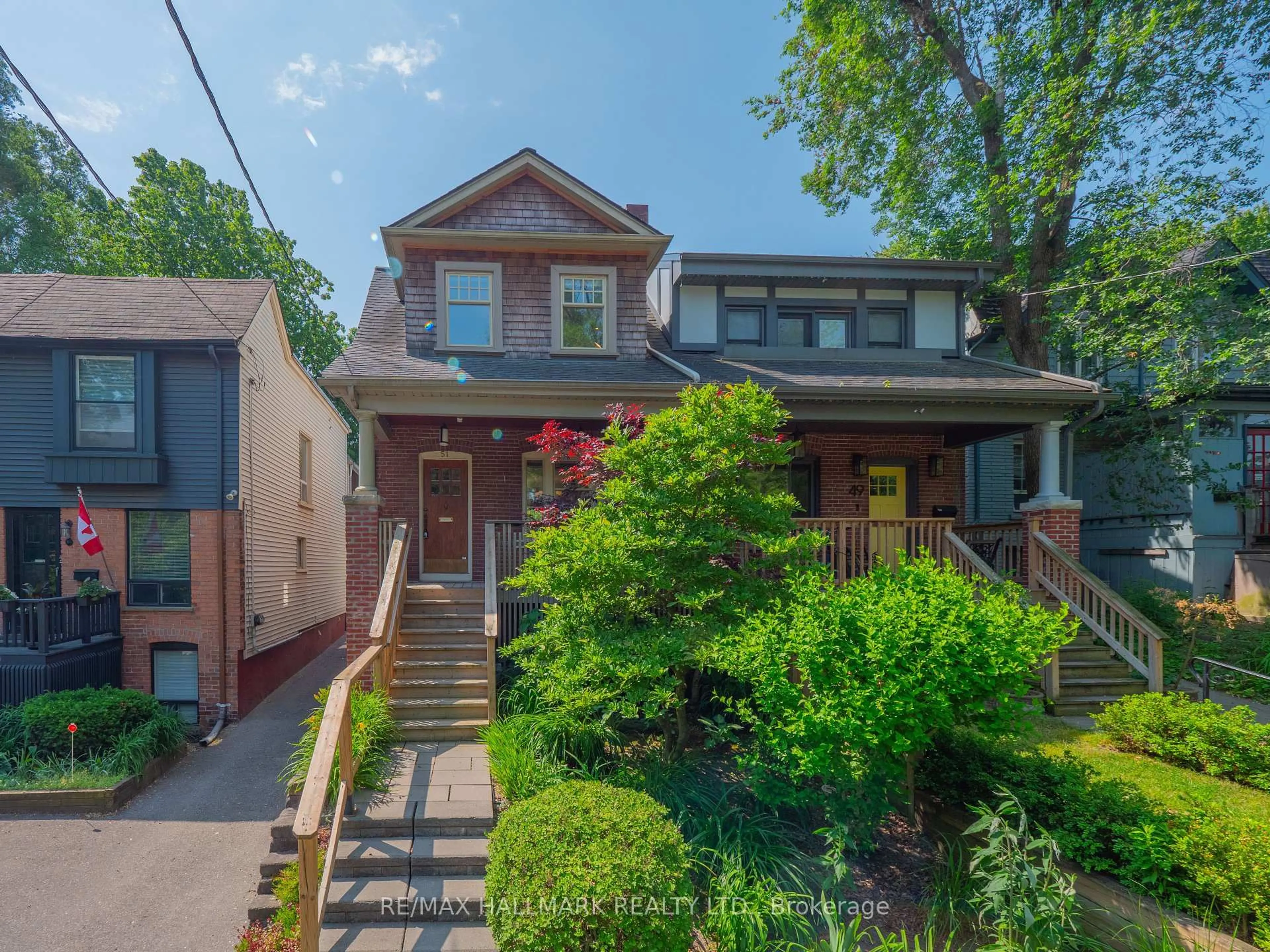Home with brick exterior material, street for 51 Bain Ave, Toronto Ontario M4K 1E5
