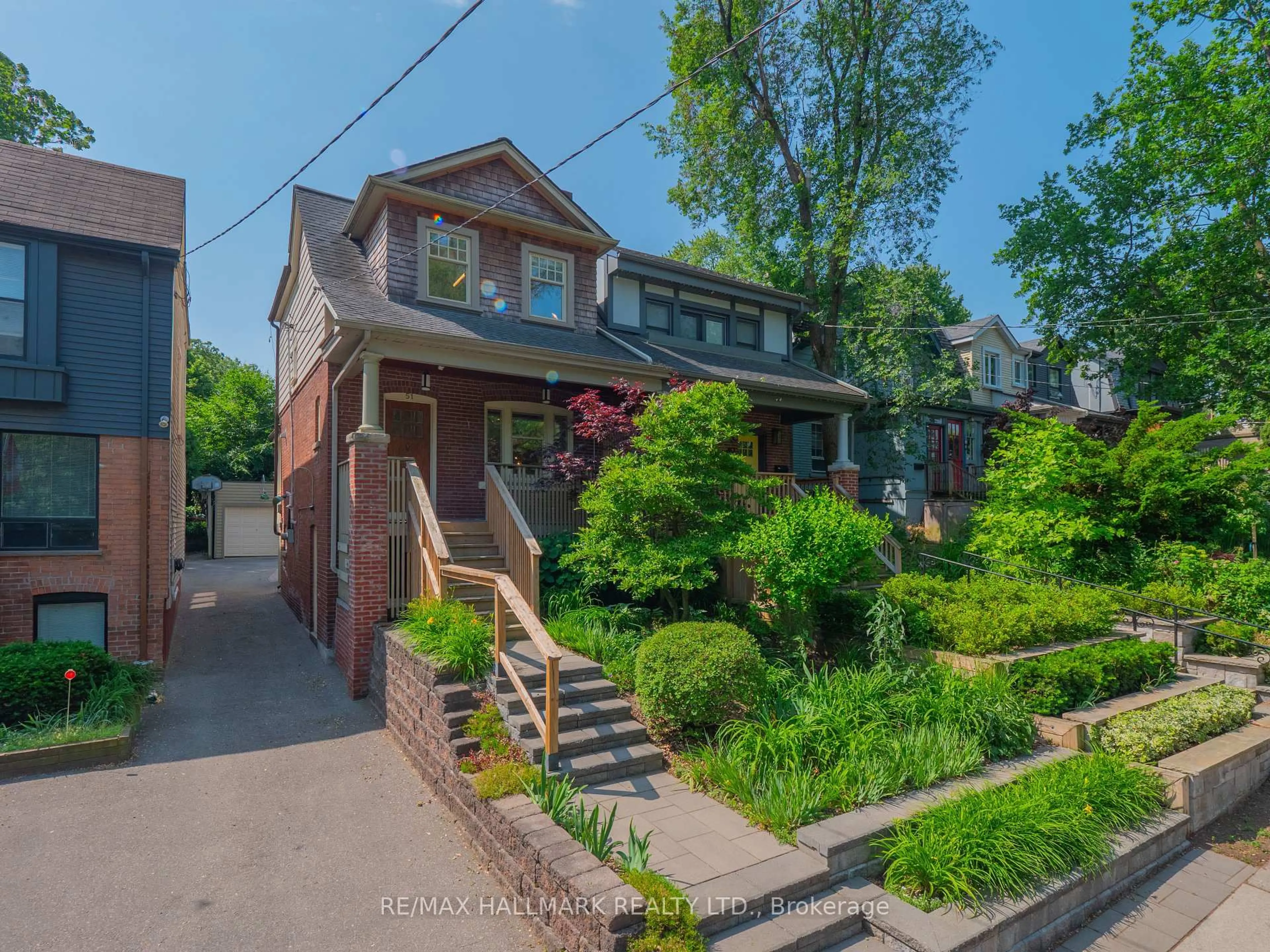 Home with brick exterior material, street for 51 Bain Ave, Toronto Ontario M4K 1E5