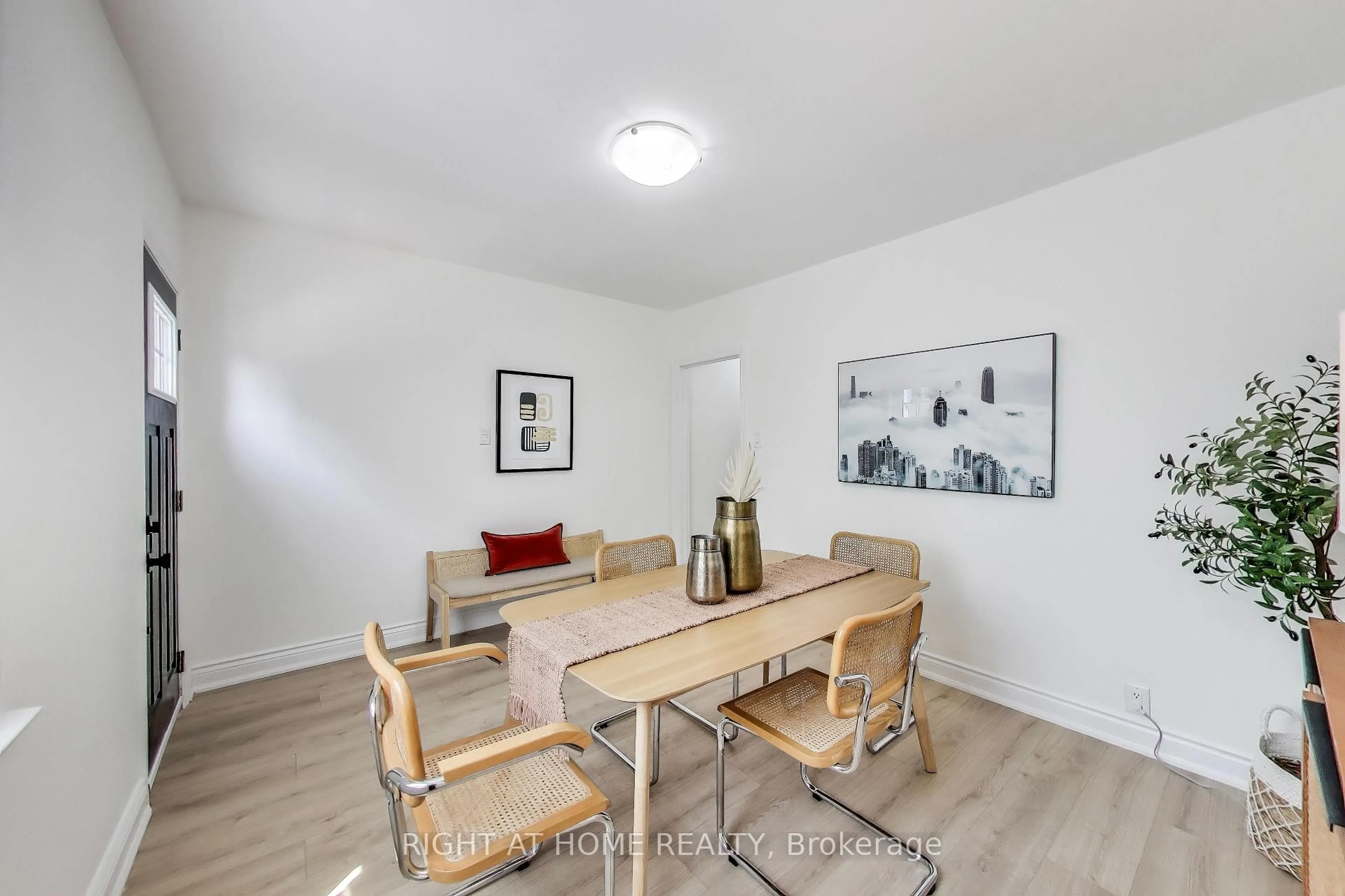 Dining room, wood/laminate floor for 1071 Craven Rd, Toronto Ontario M4J 4V7