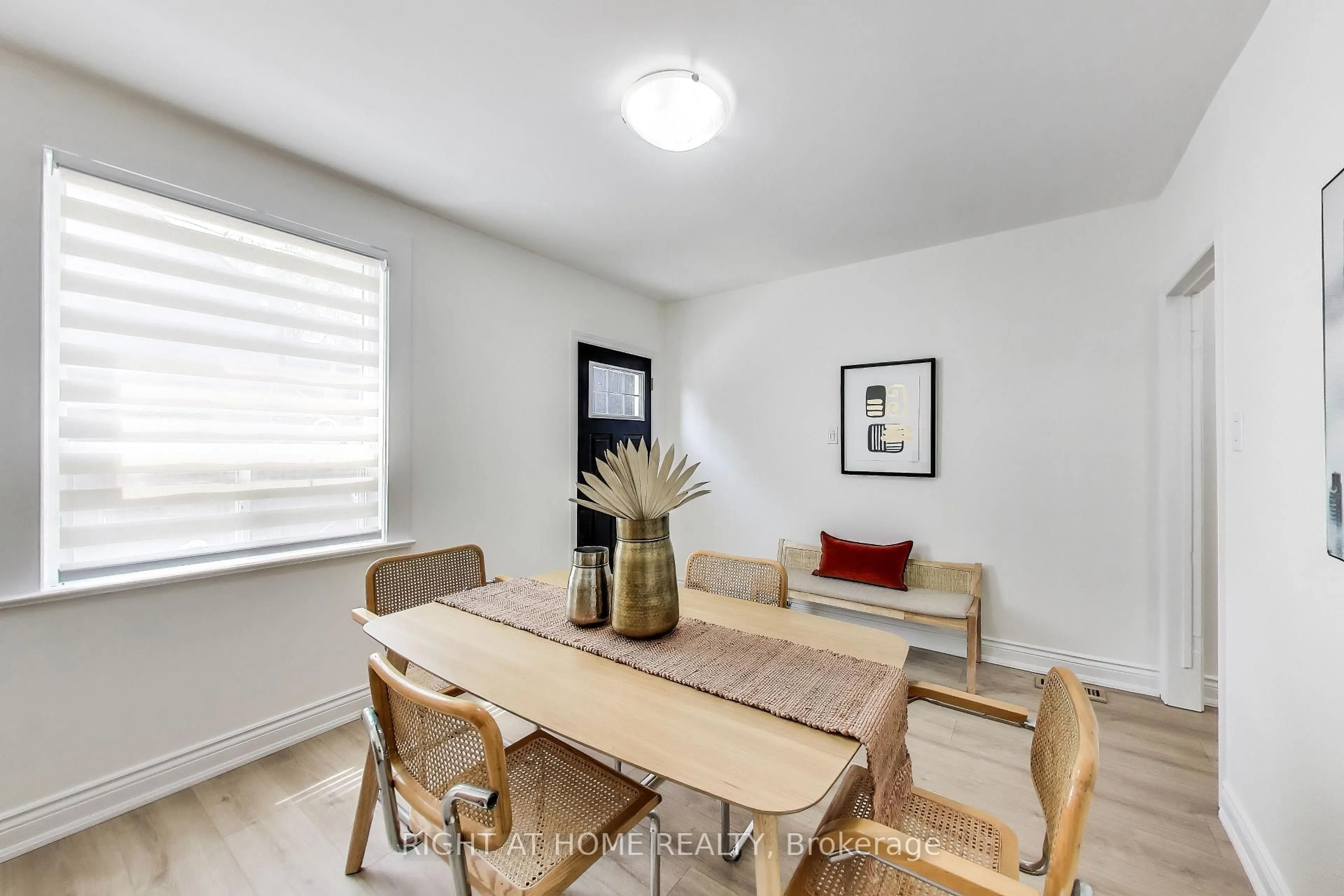 Dining room, wood/laminate floor for 1071 Craven Rd, Toronto Ontario M4J 4V7