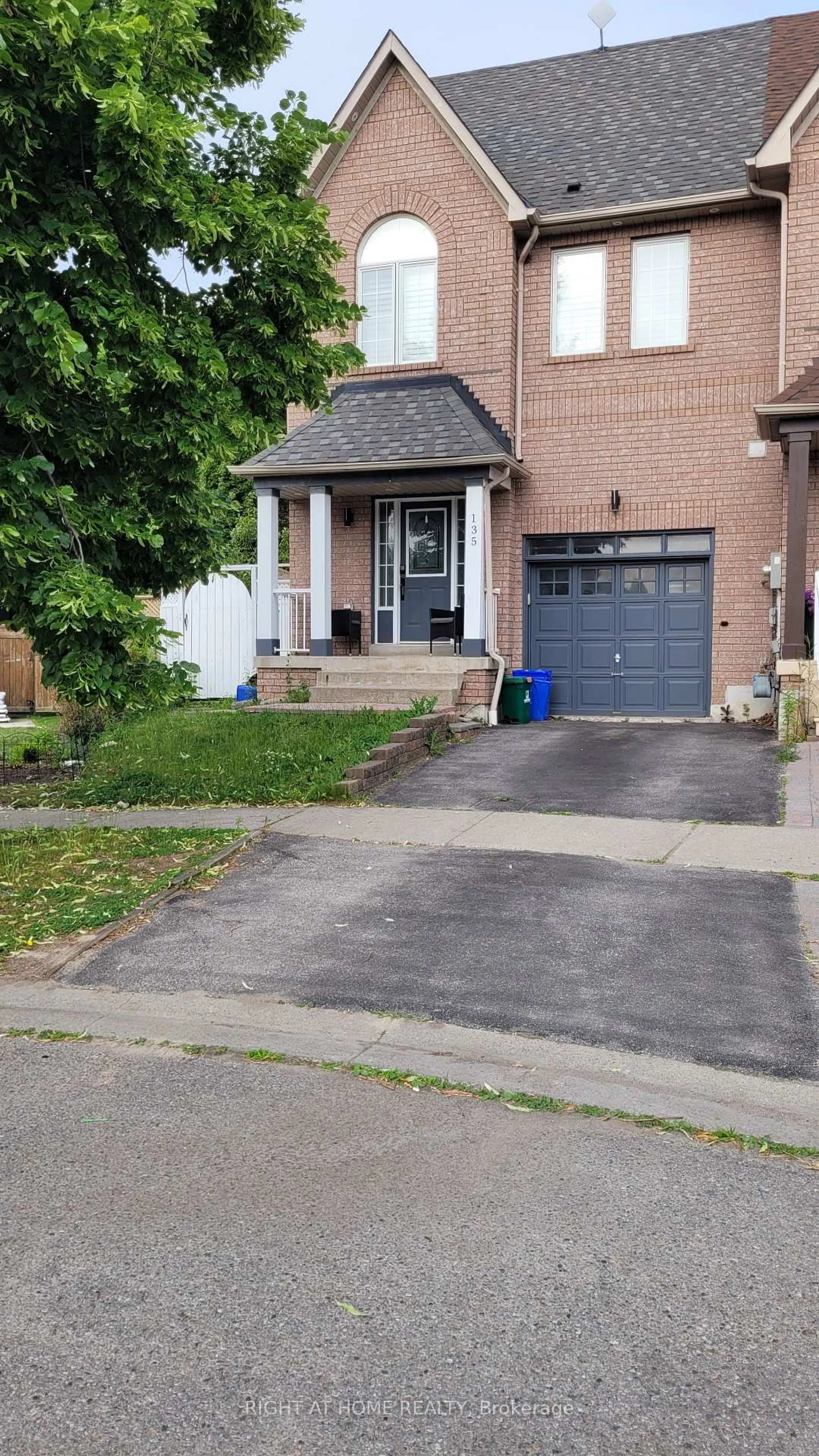 Home with brick exterior material, street for 135 Stokely Cres, Whitby Ontario L1N 9S9