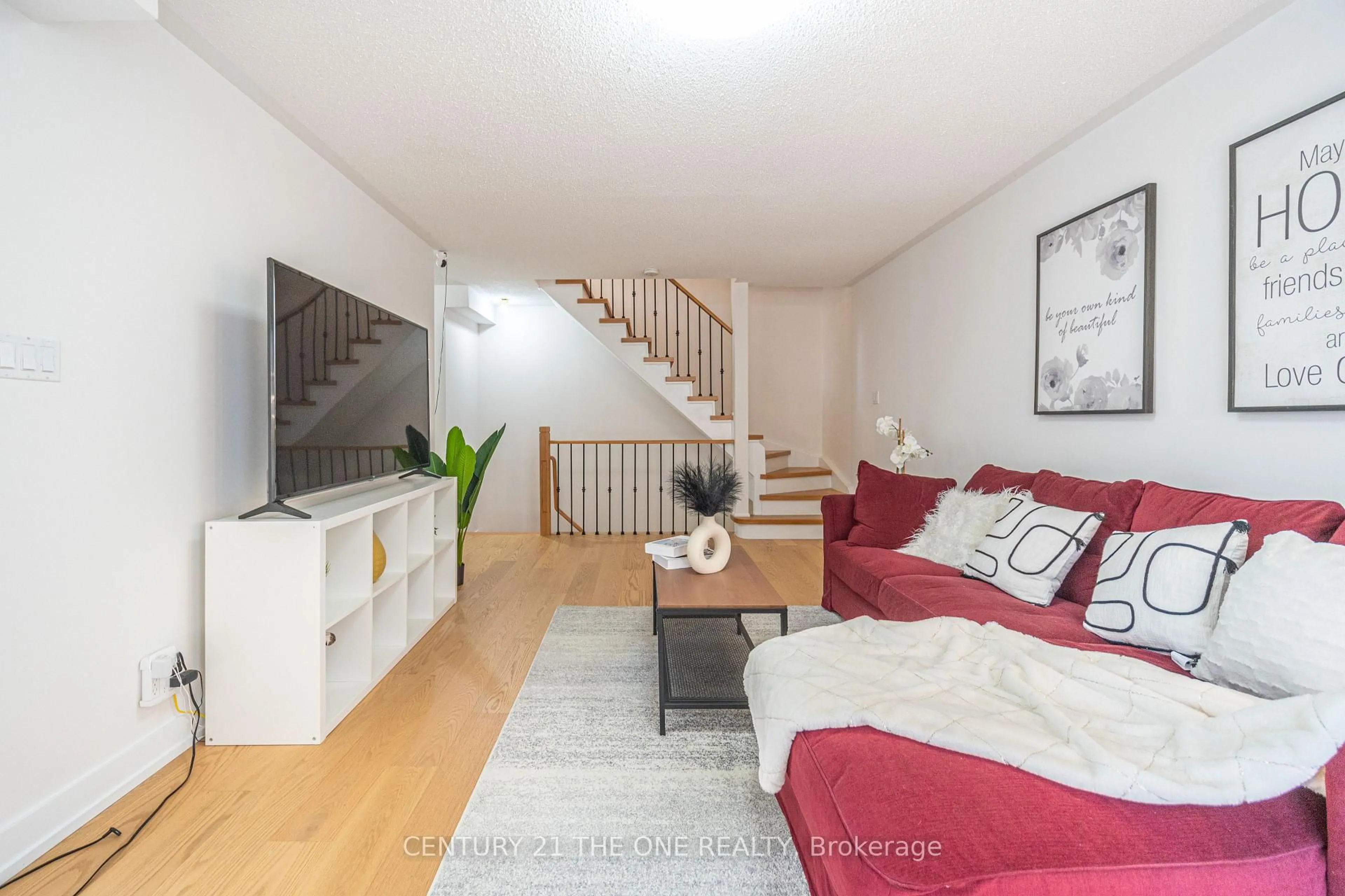 Living room with furniture, unknown for 28 Rosebank Dr #1102, Toronto Ontario M1B 5Z1