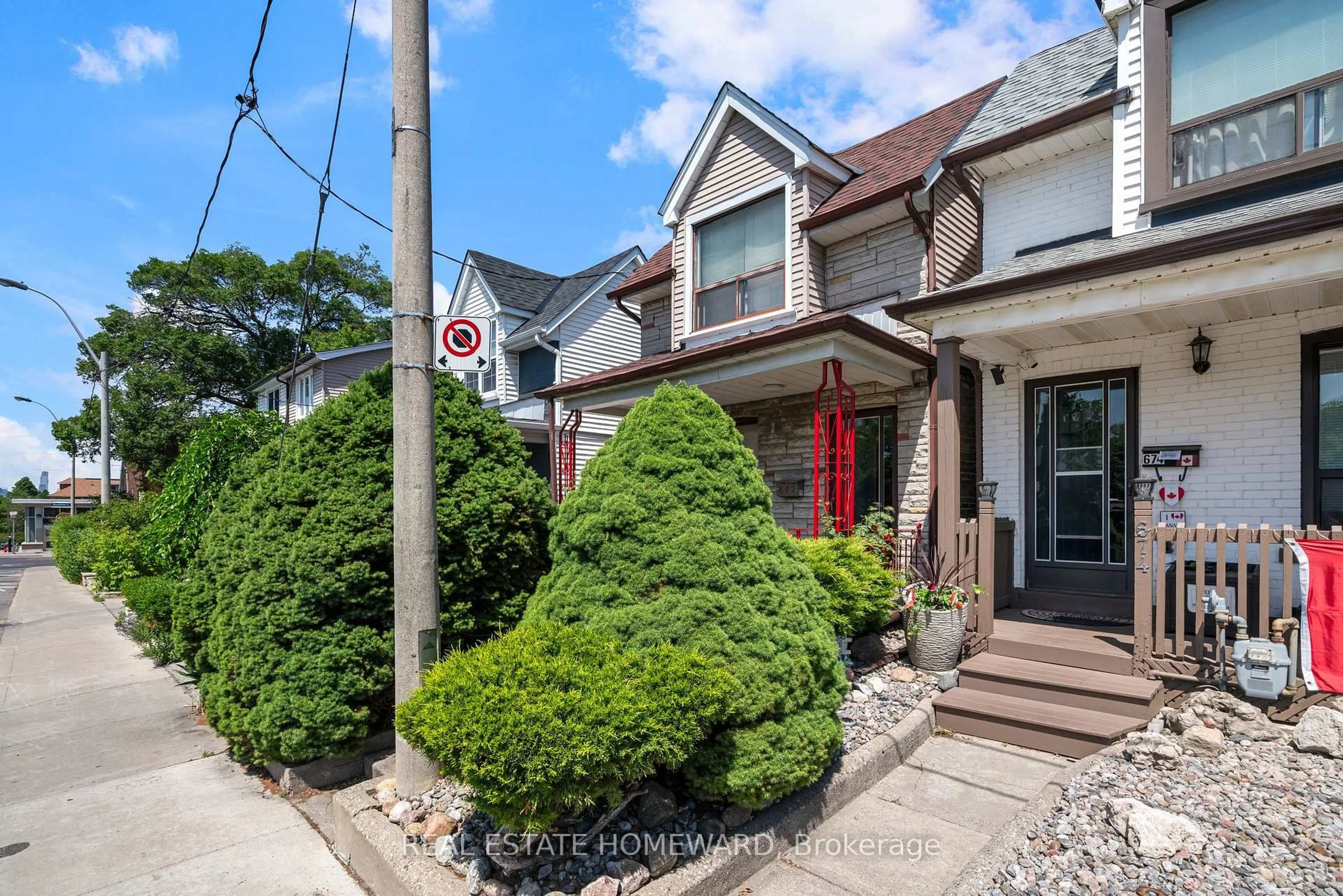 Home with brick exterior material, street for 672 Strathmore Blvd, Toronto Ontario M4C 1P2